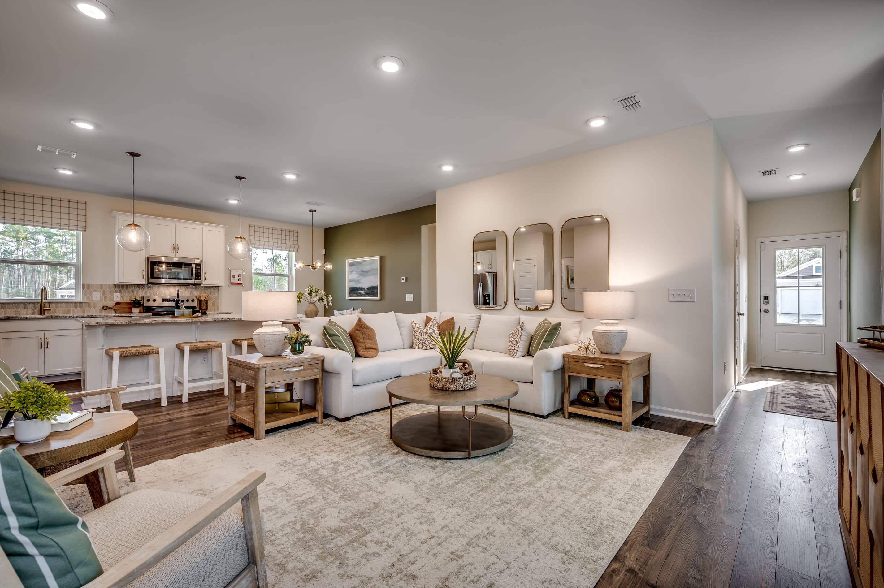 tan walls and hardwood throughout 
