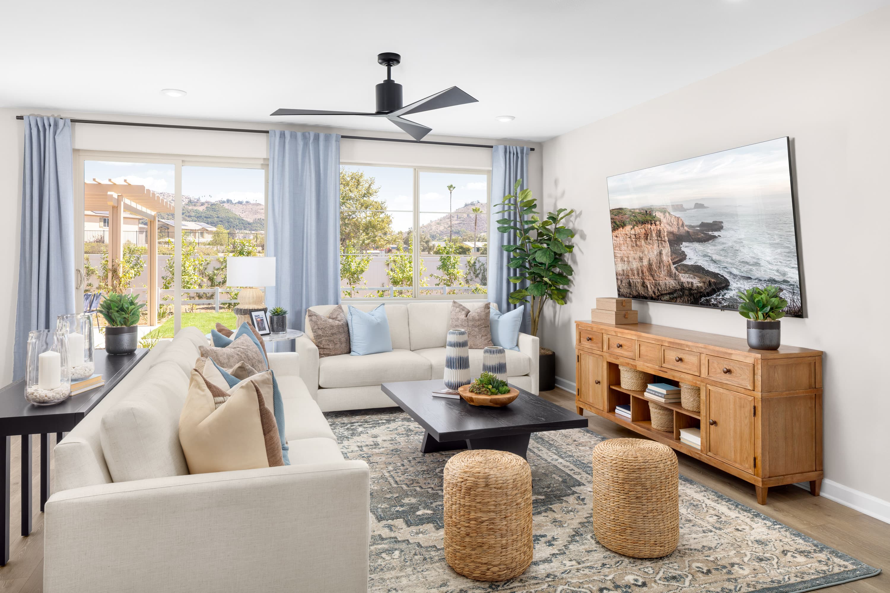 great room with two white couches