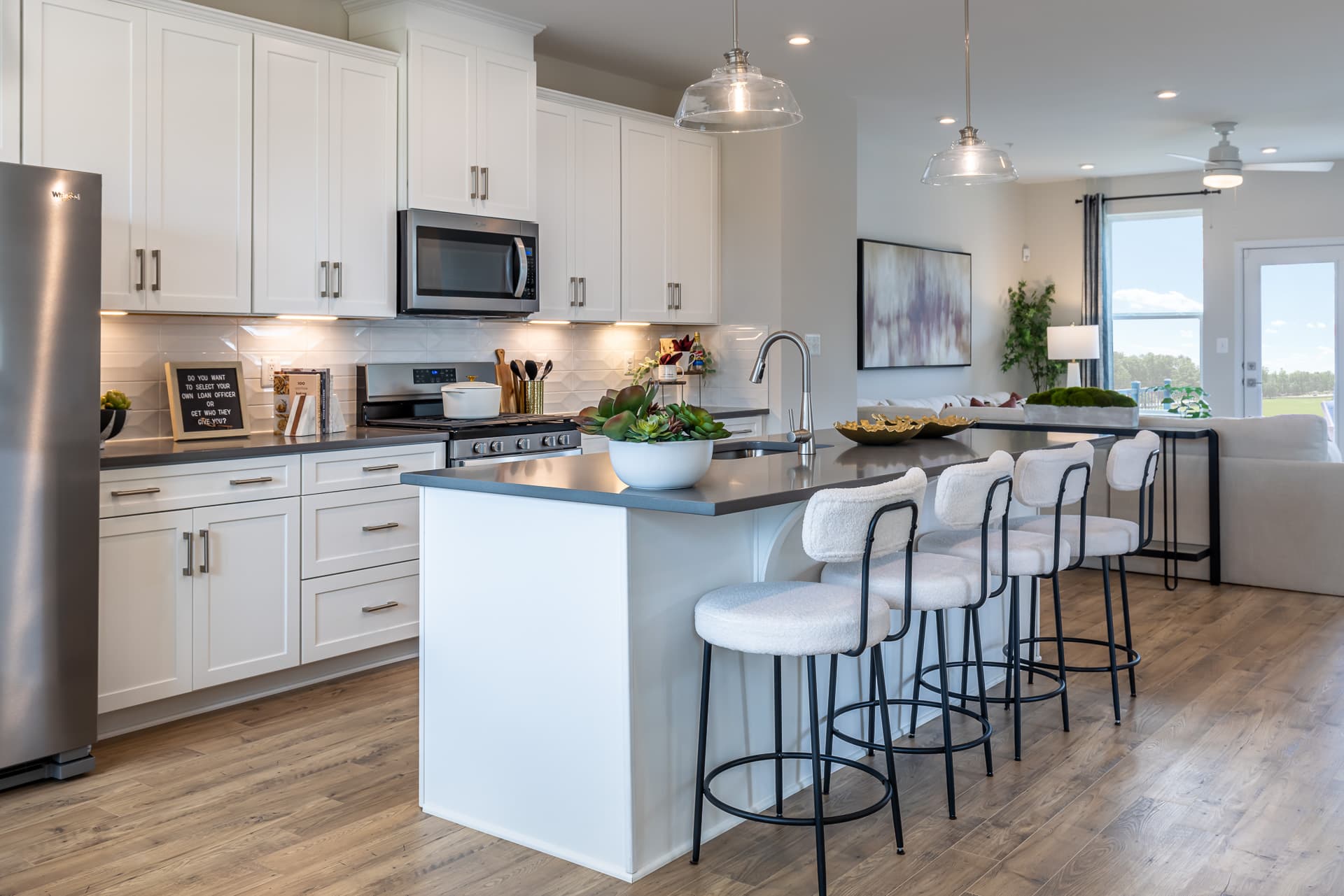 kitchen with white cabinets & granite countertops
