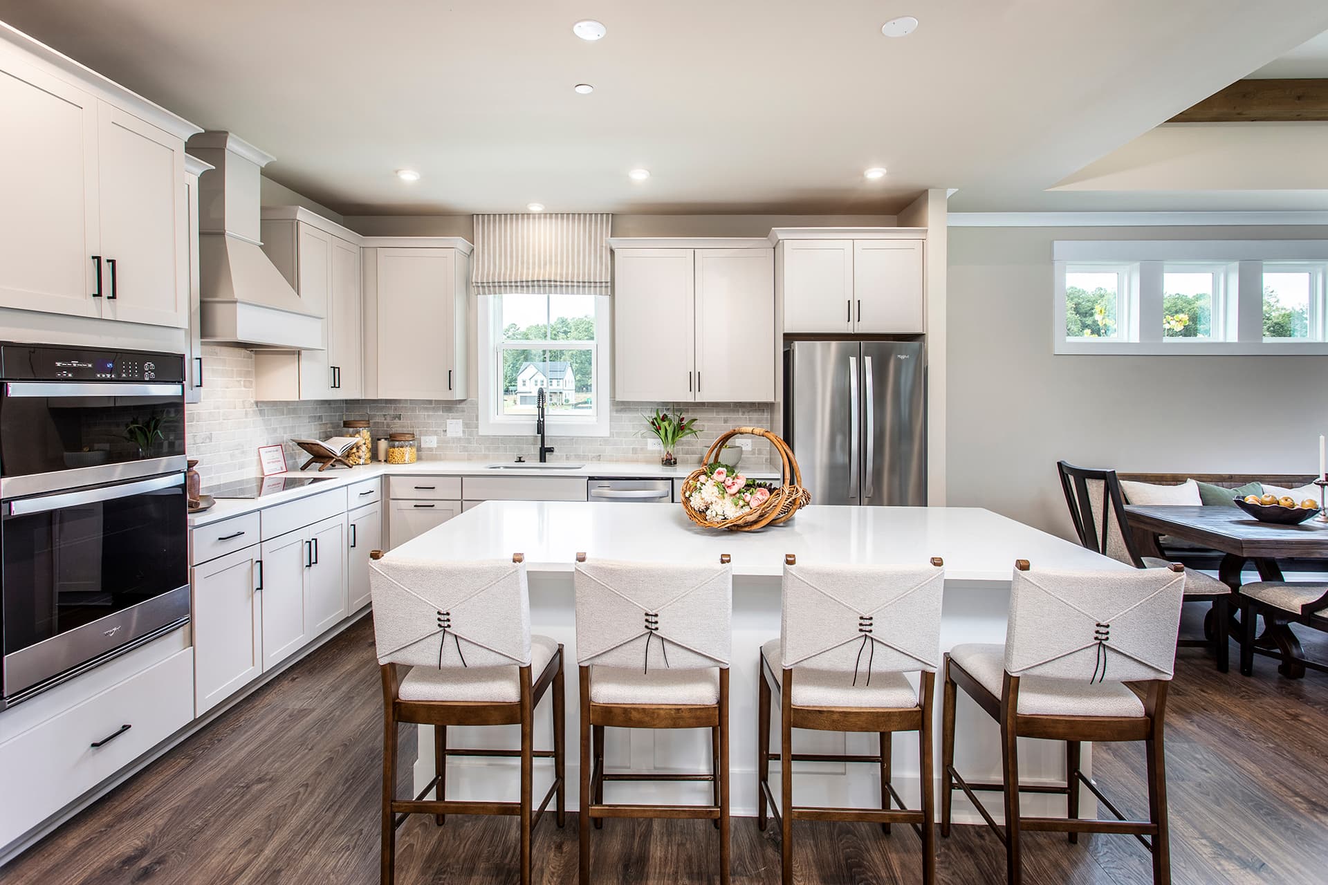 kitchen with center island and white cabinets