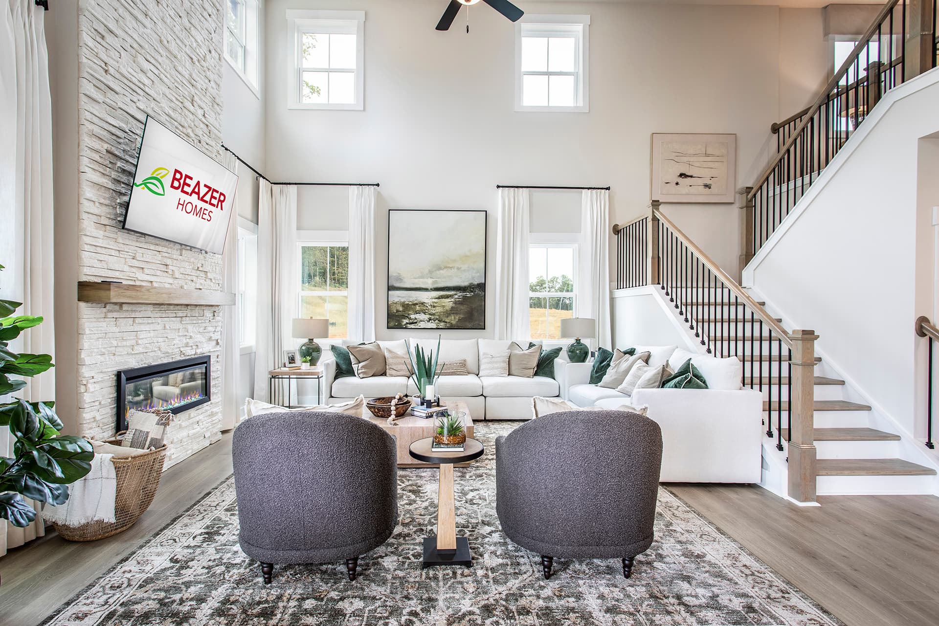 great room with 2-story ceilings and fireplace