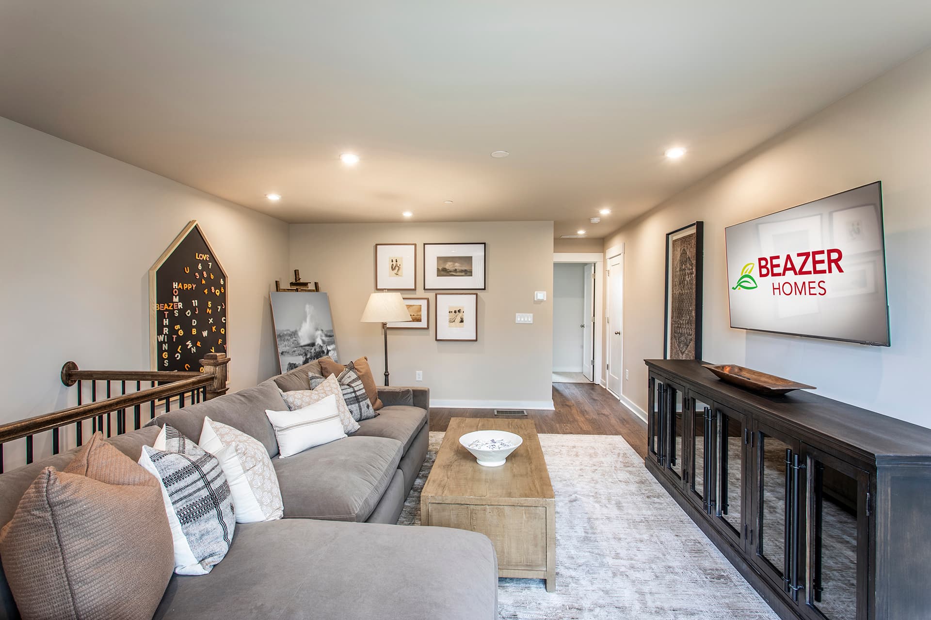loft with hard-surface flooring and tv room