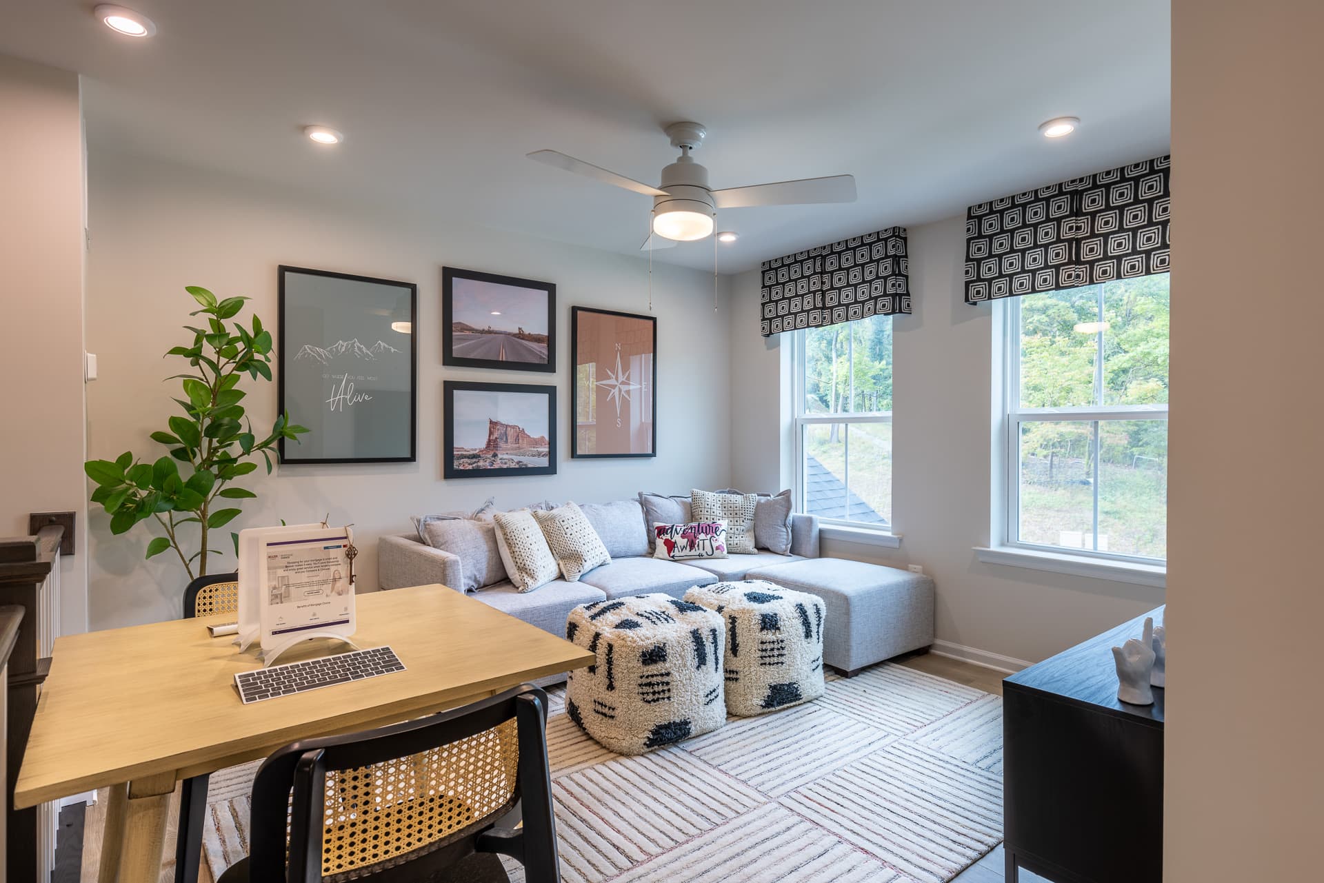 2nd-floor loft with carpet and a couch