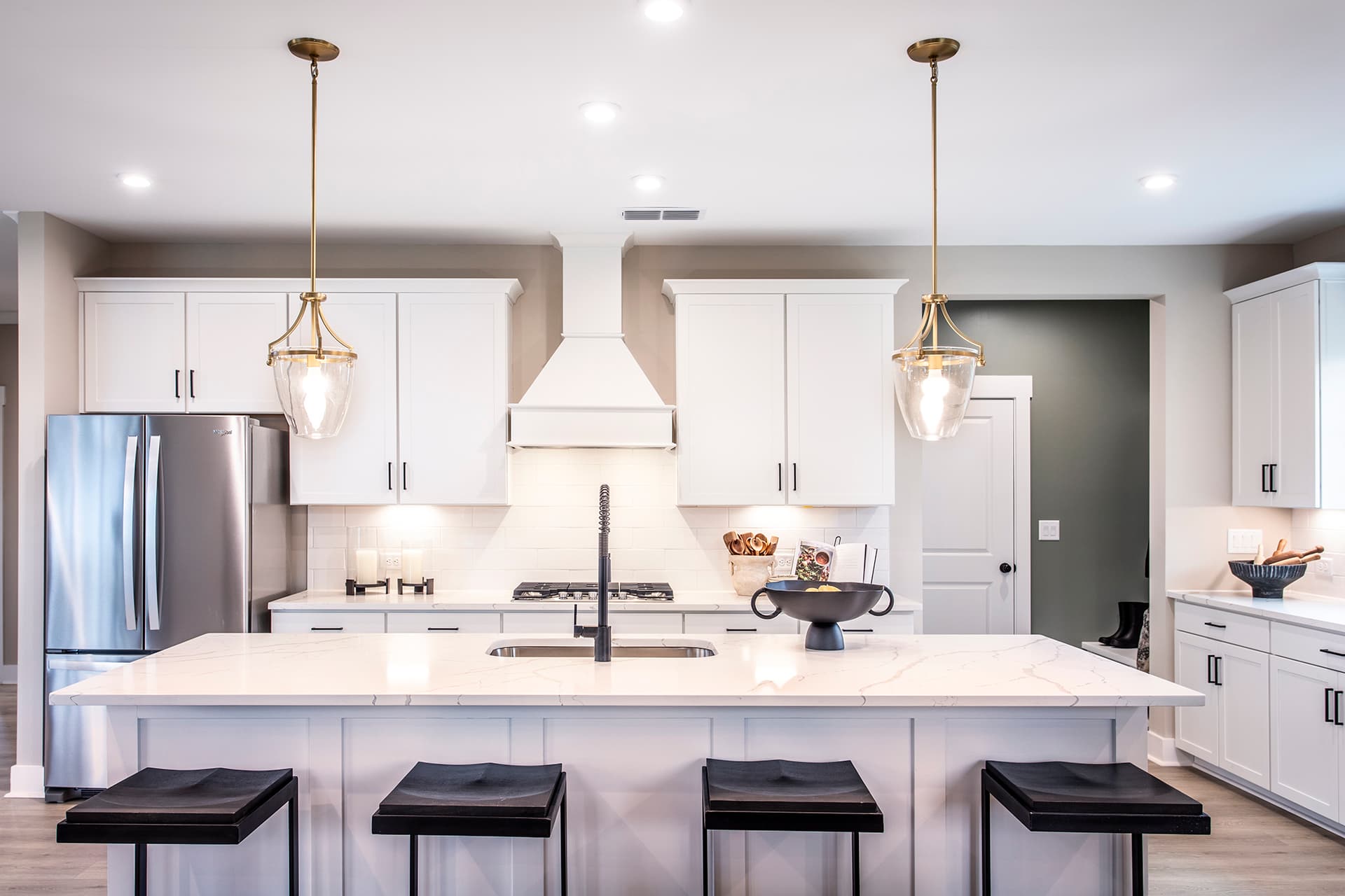 kitchen with expansive island & quartz countertops