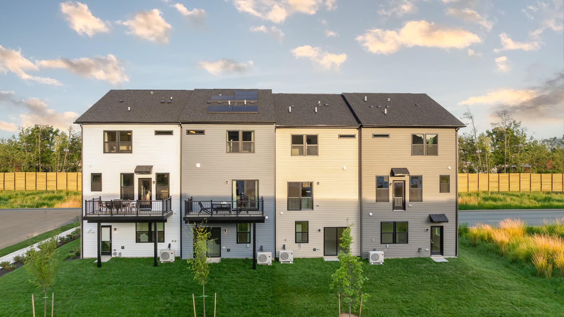 rear exteriors showing with and without a deck