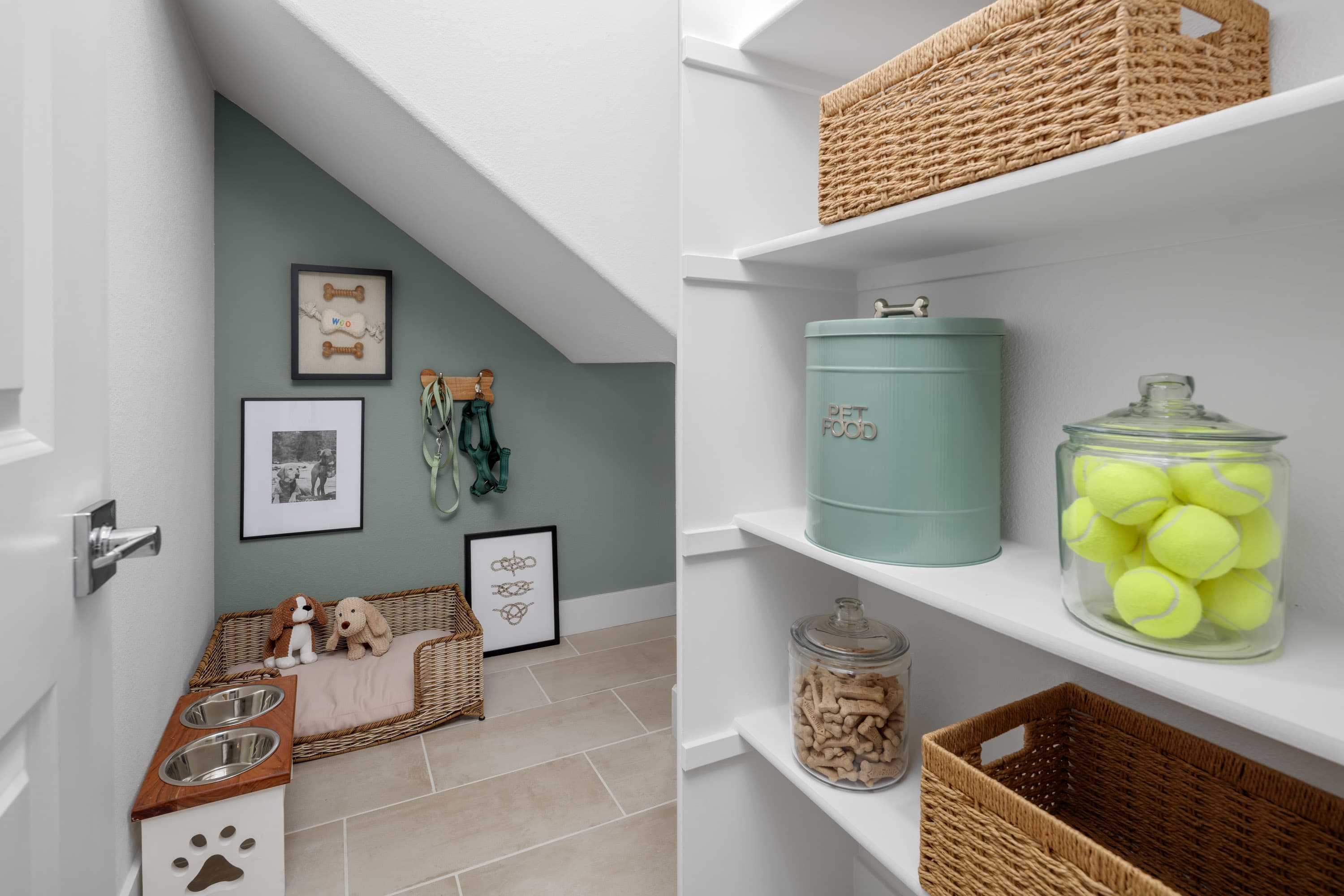 storage room with shelves and green wall