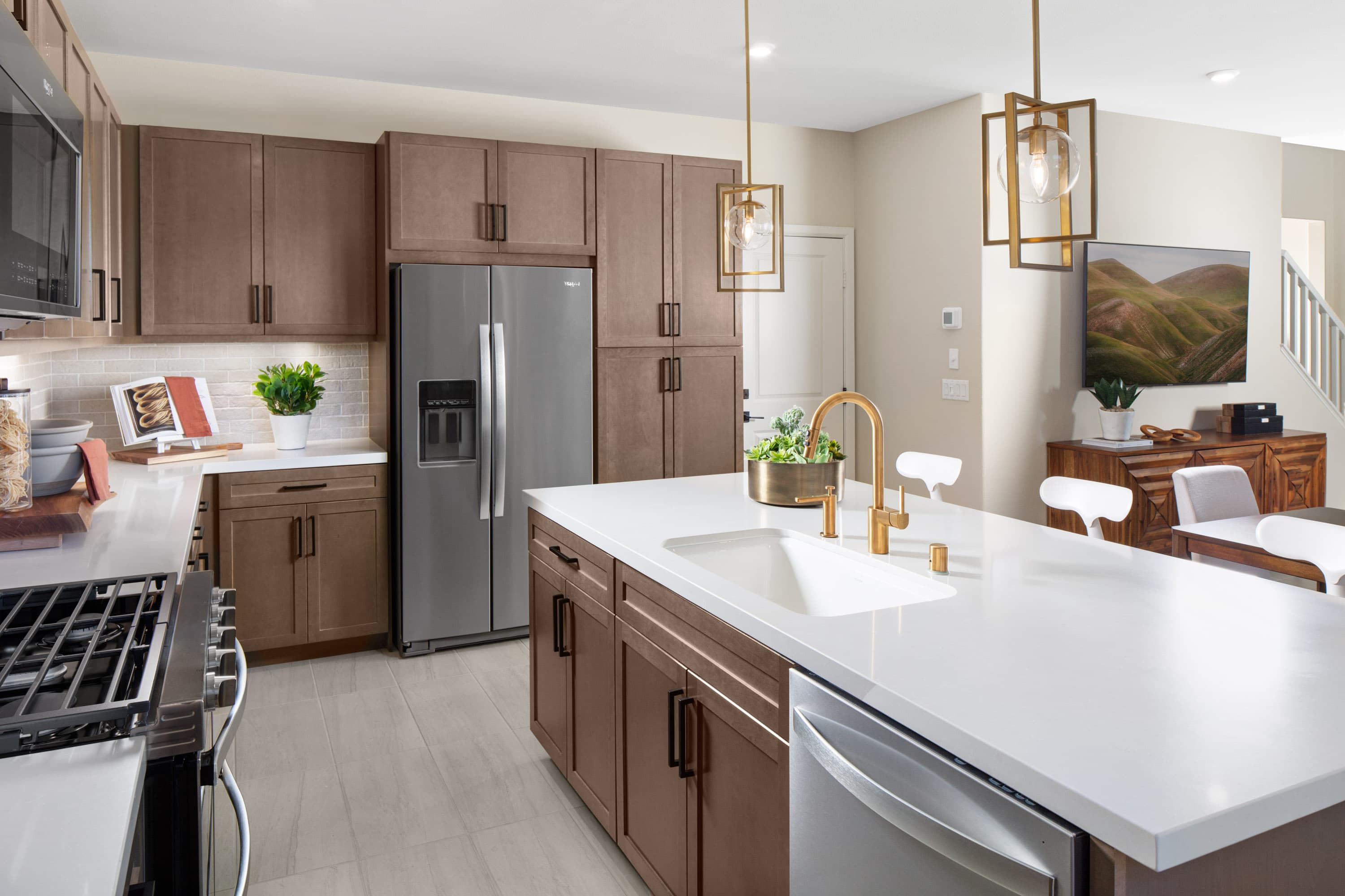 kitchen with large island and brown cabinetry