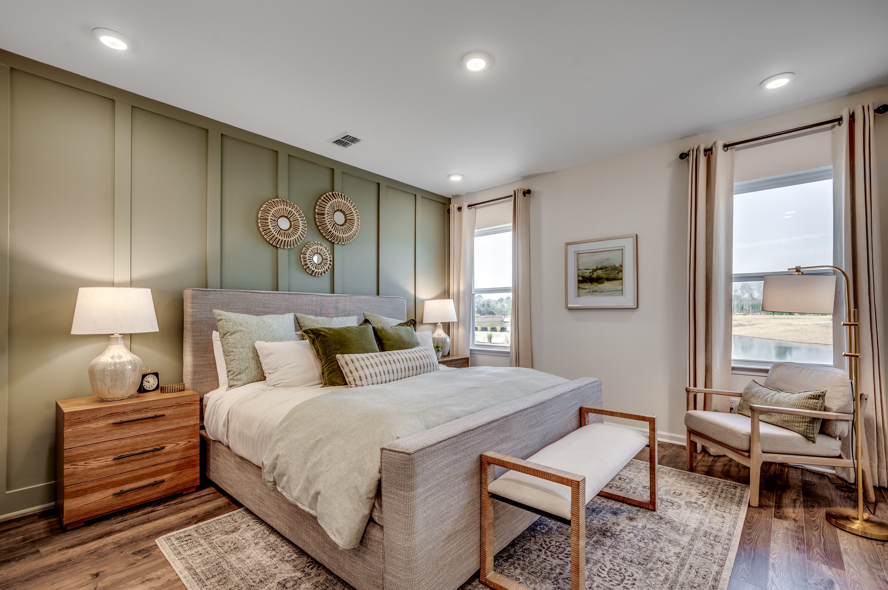 windows for natural light and hardwood throughout