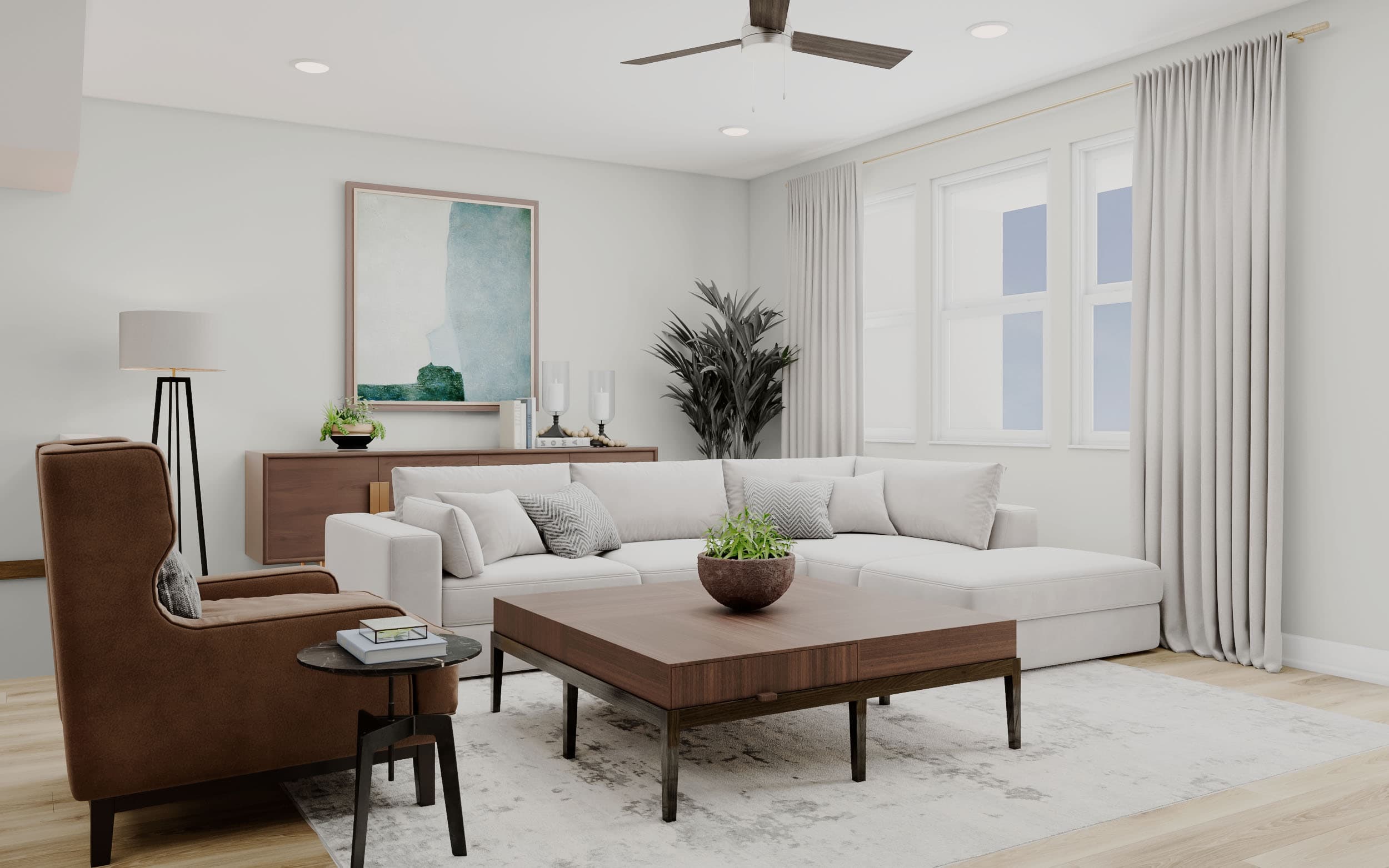 great room with sofa, coffee table, and chair