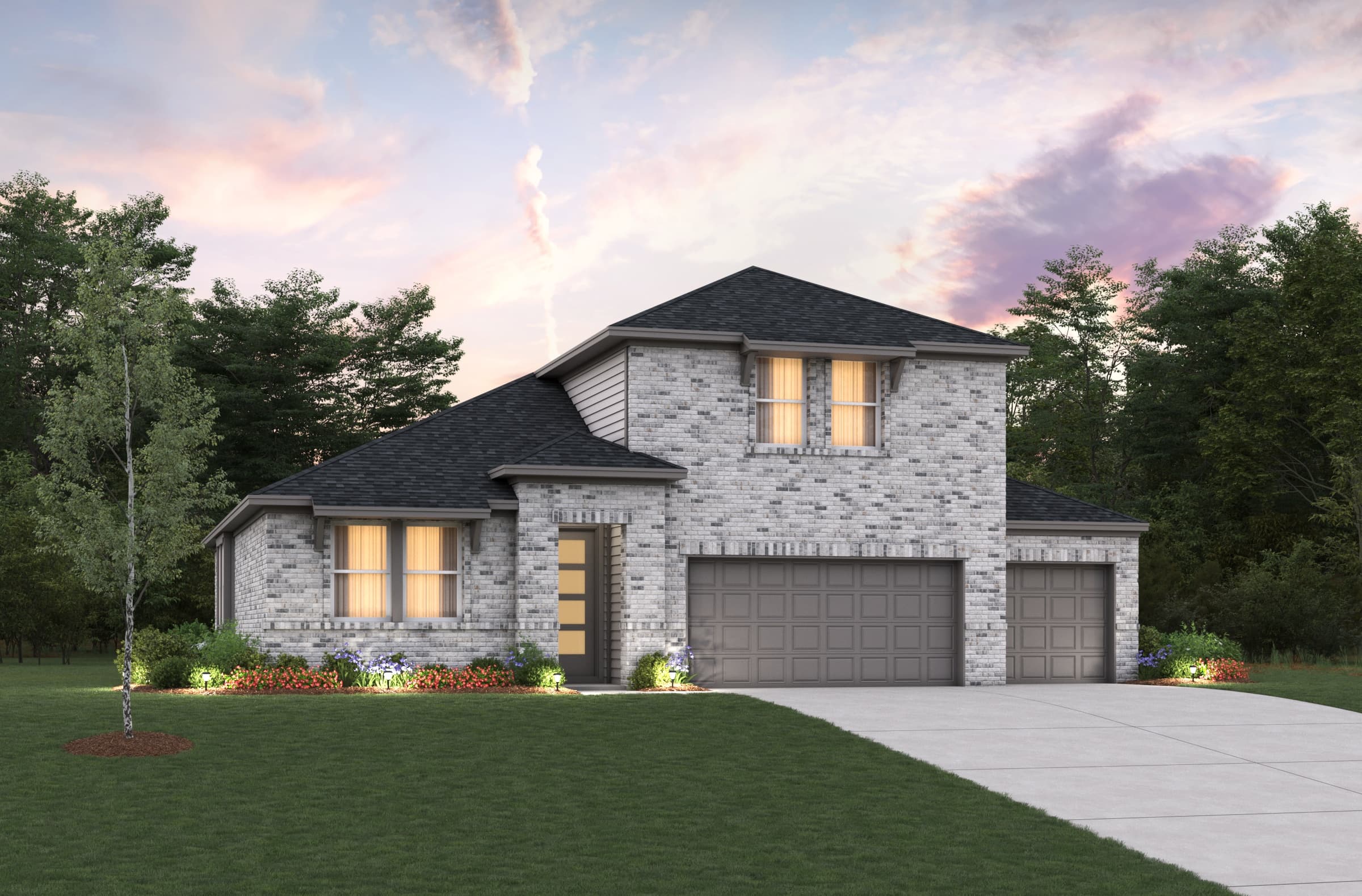 Grey brick exterior home with dusk sky