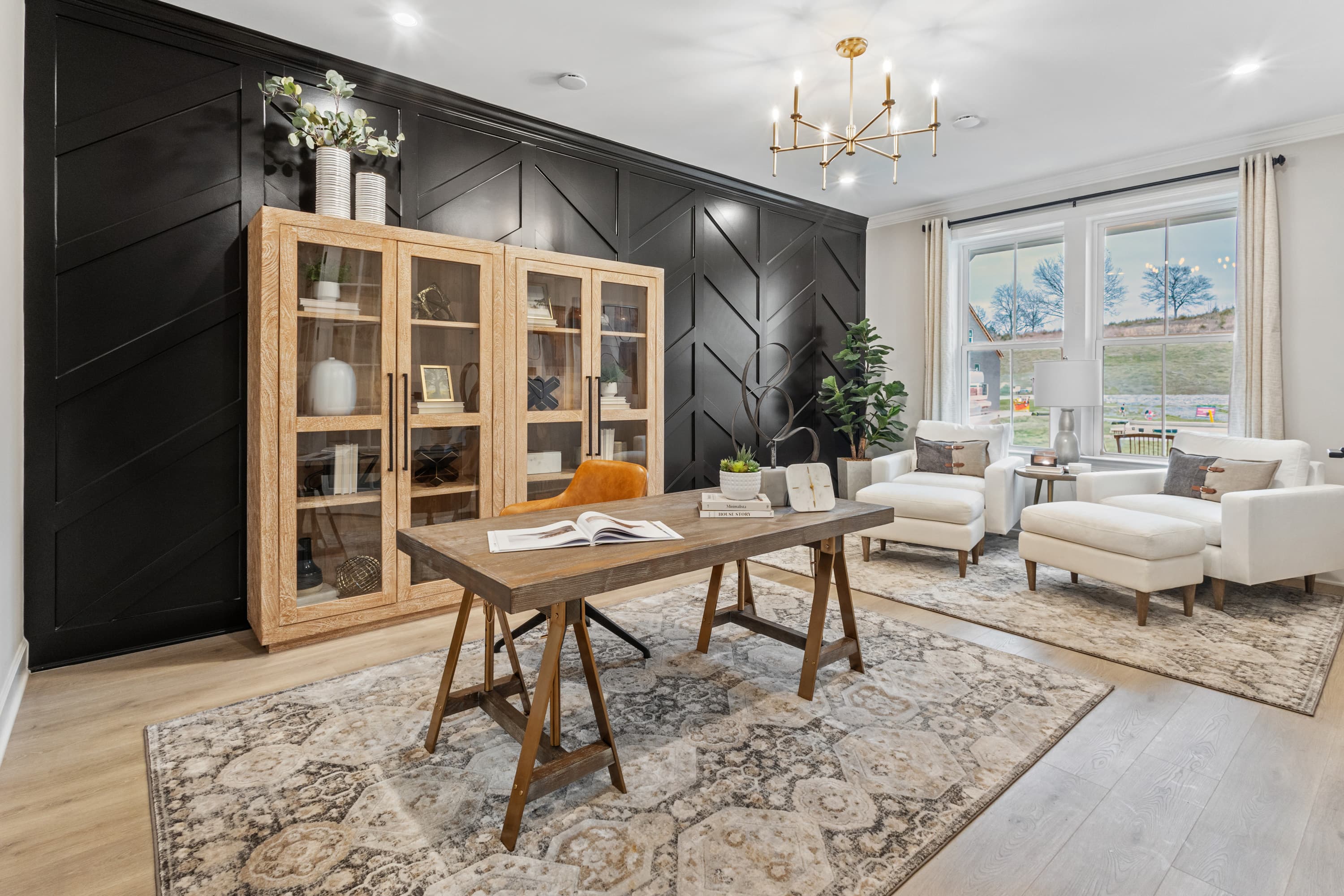 study room with hardwood floors and a desk