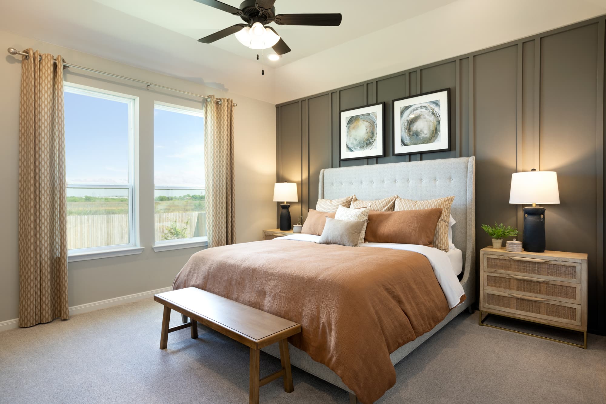 bedroom with black accent wall & carpet