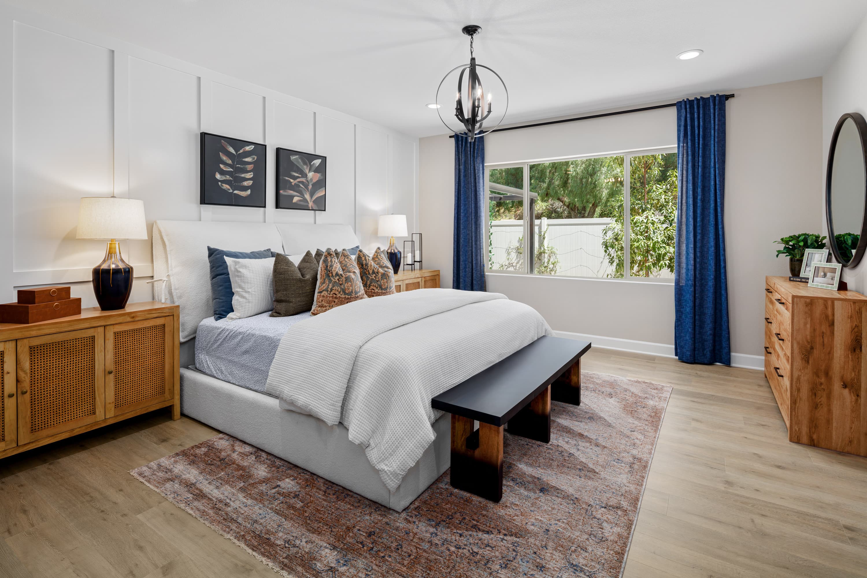 primary bedroom with neutral floor and white walls