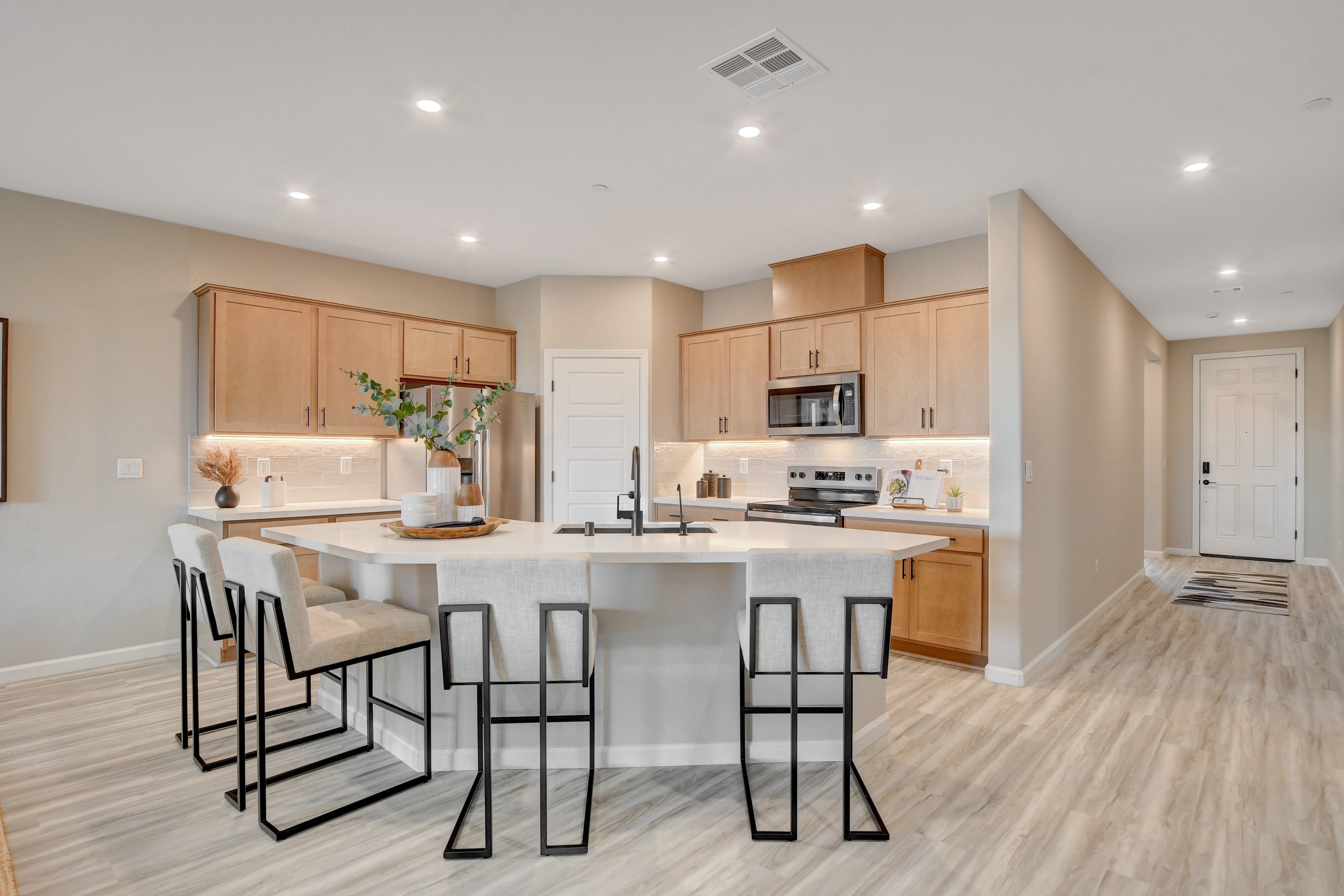 open and airy kitchen with overside island
