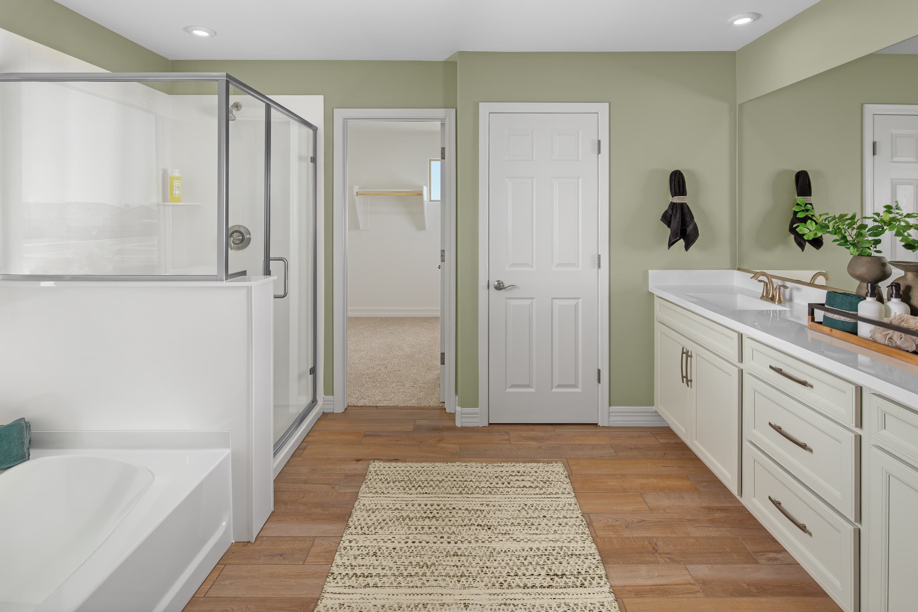 large primary bathroom with walk-in shower