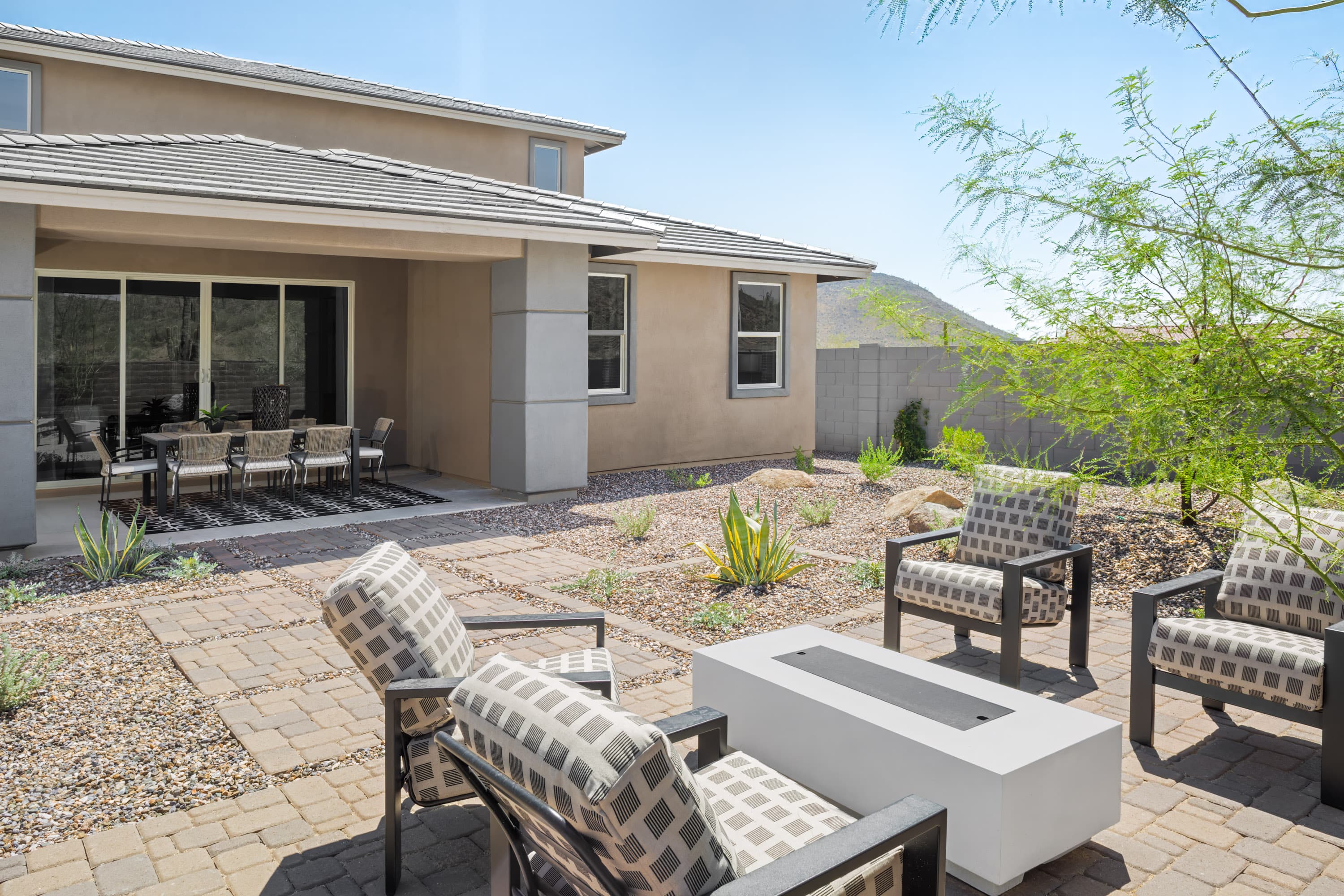 large backyard with covered patio