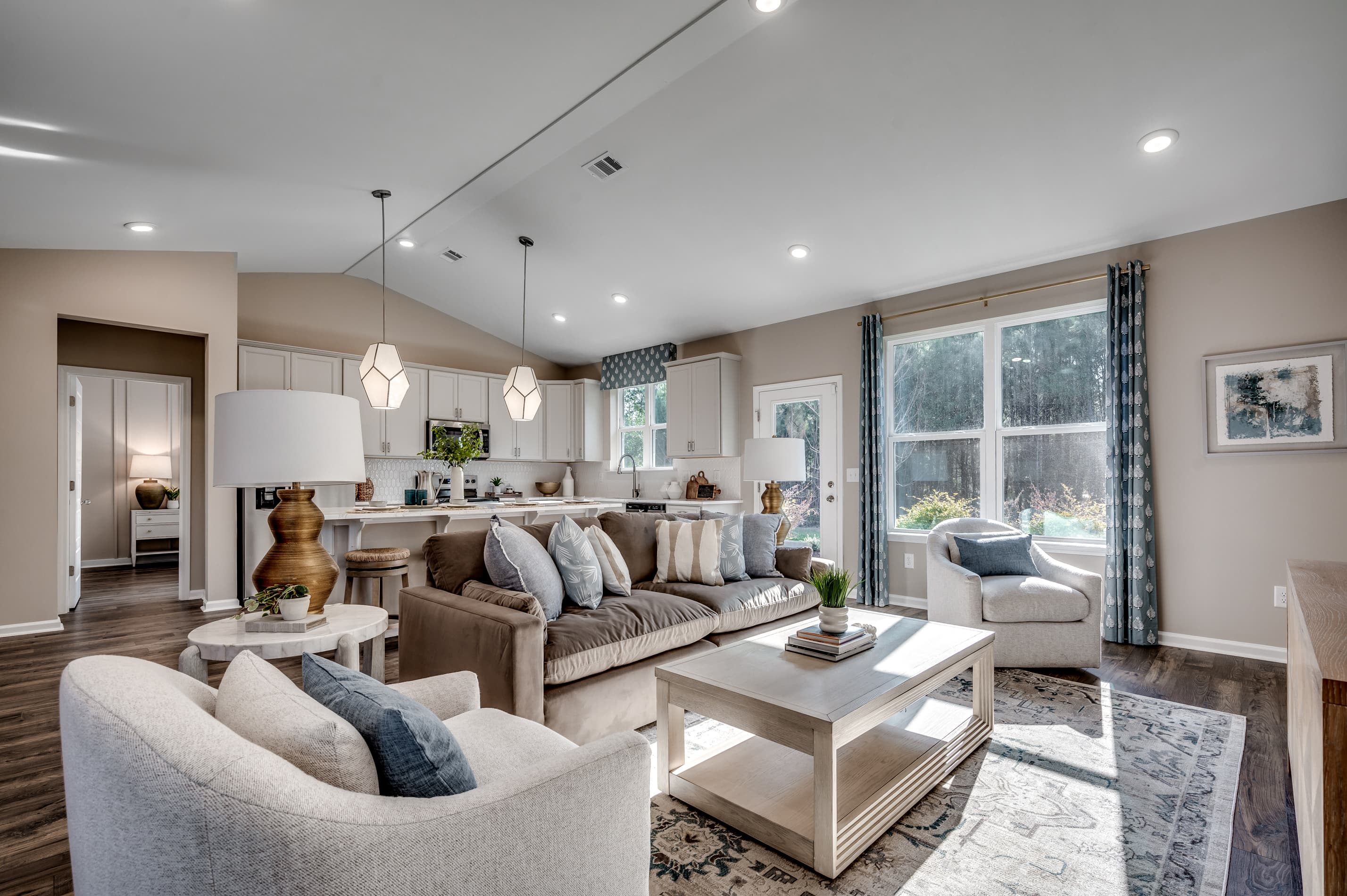 tan walls with hardwood flooring throughout