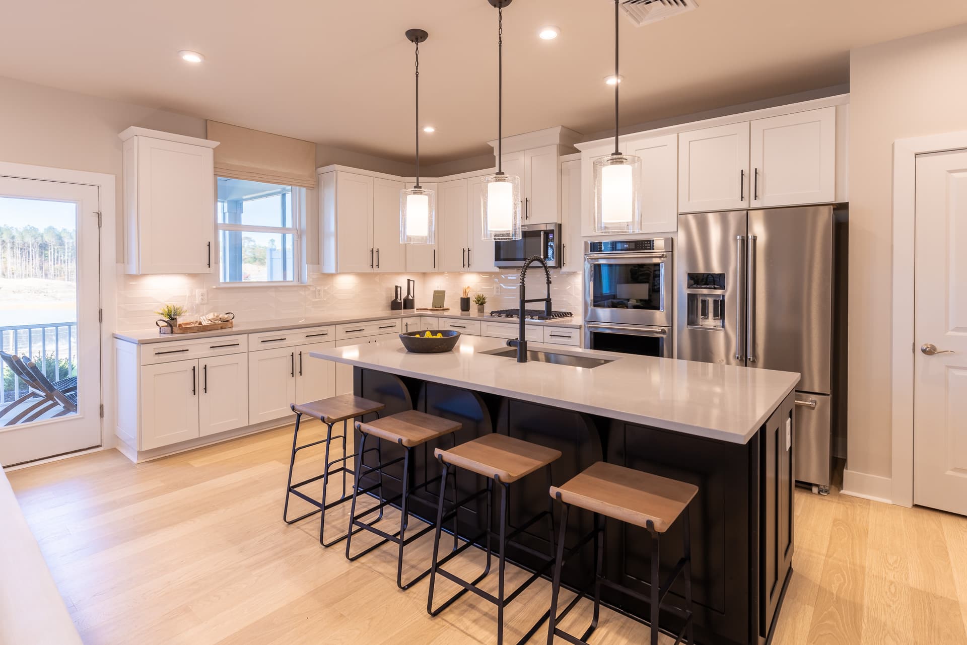 kitchen with white cabinets and a center island