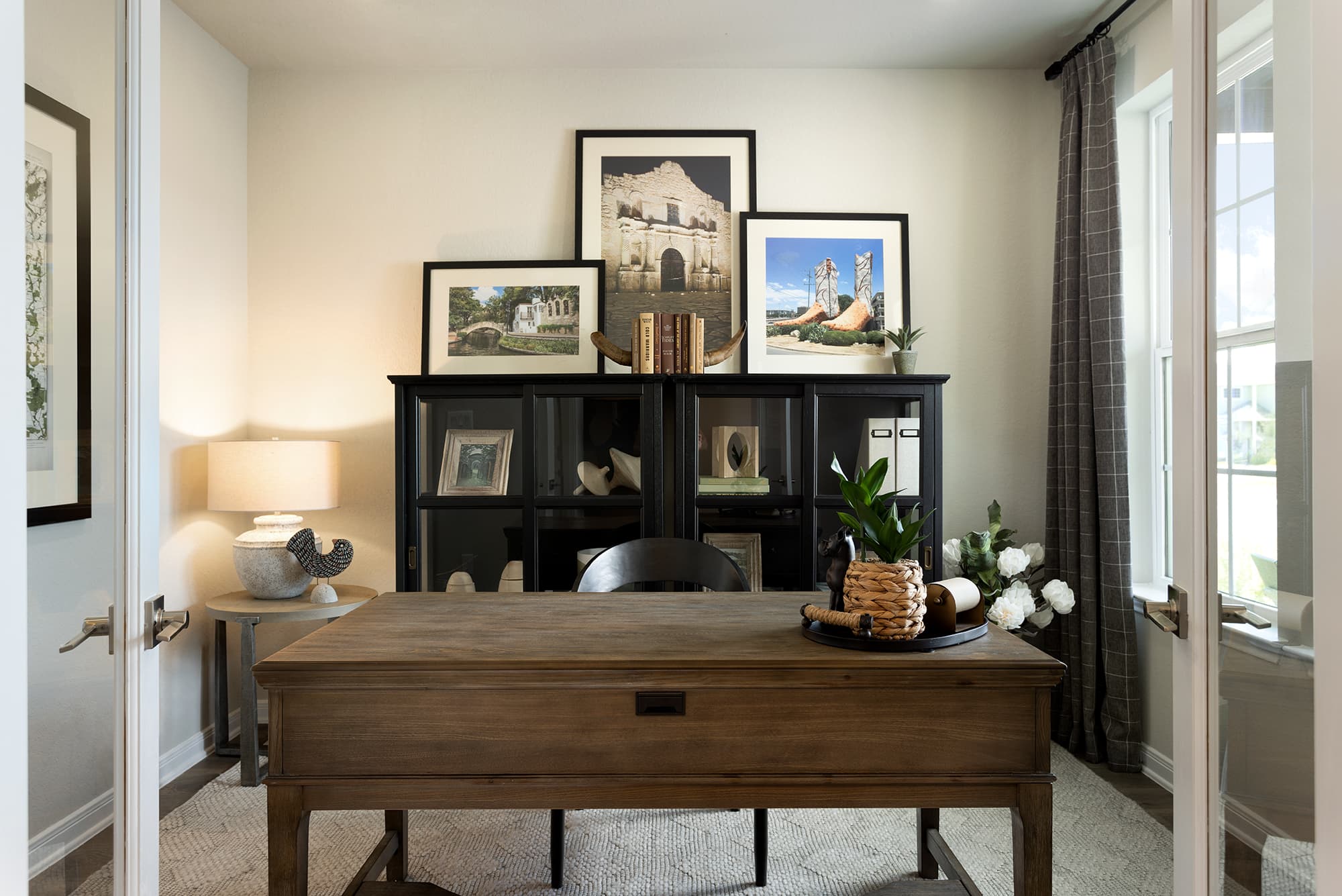 study with desk & pictures on the wall