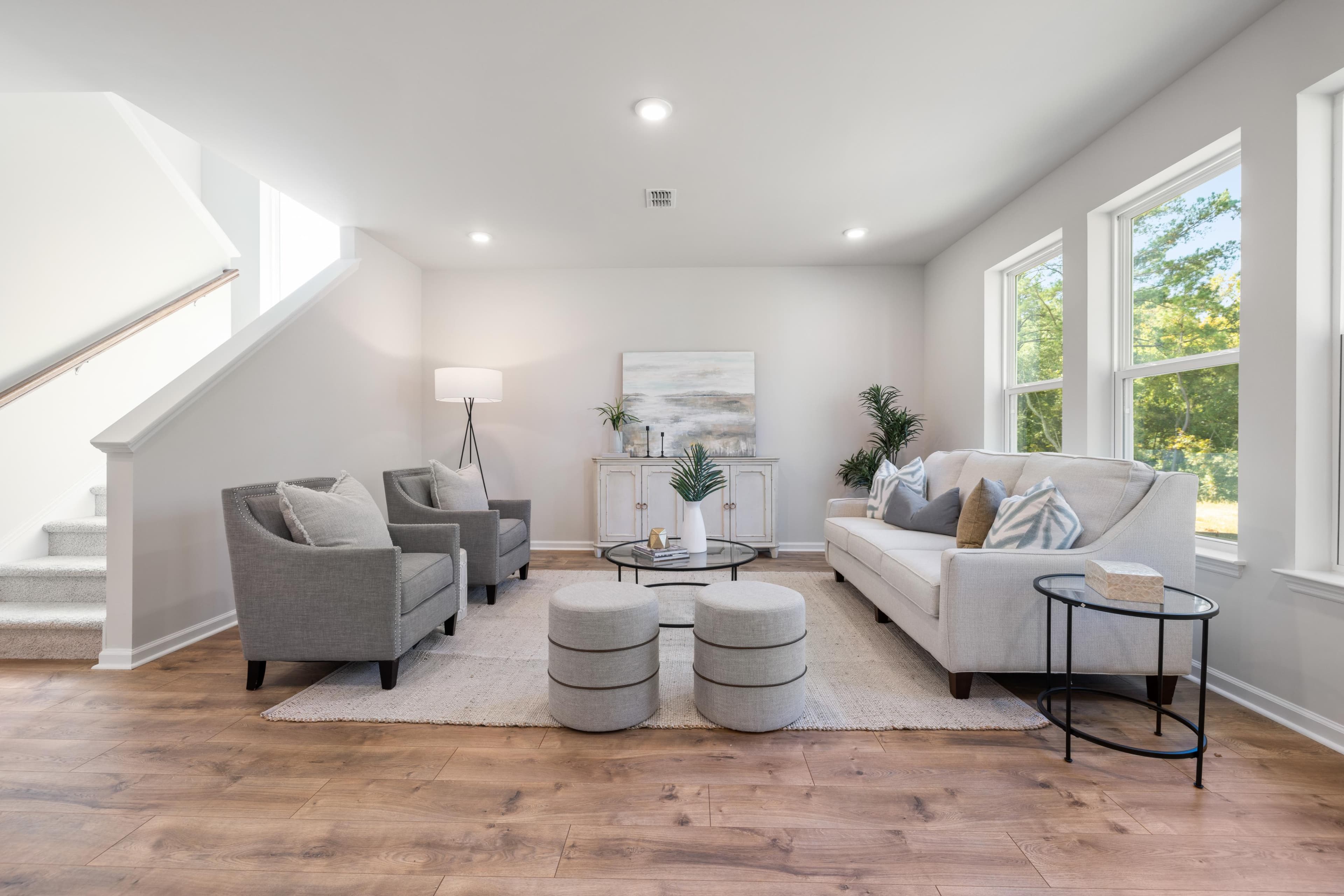 open great room with windows to the exterior