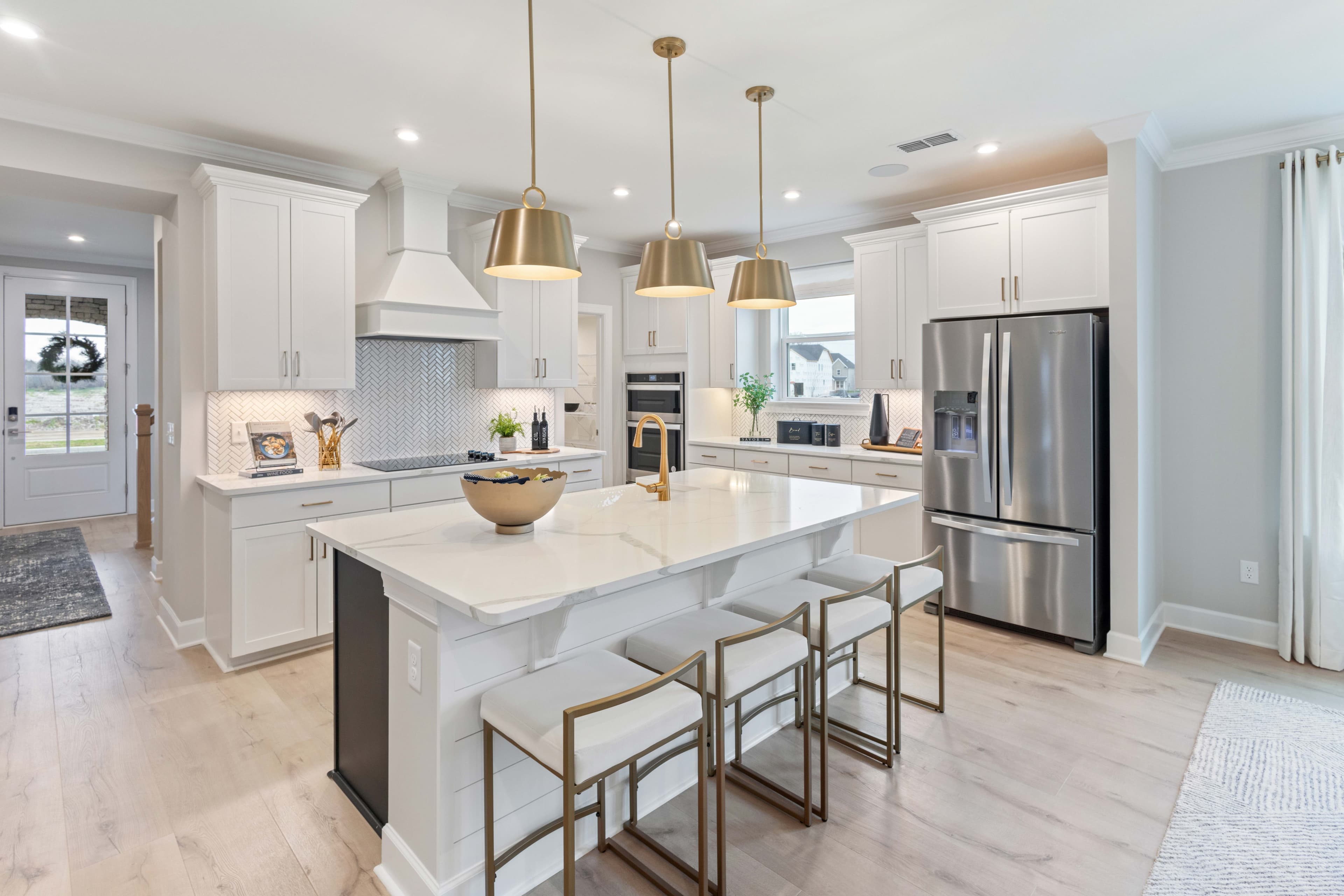 kitchen with white cabinets and quartz countertops