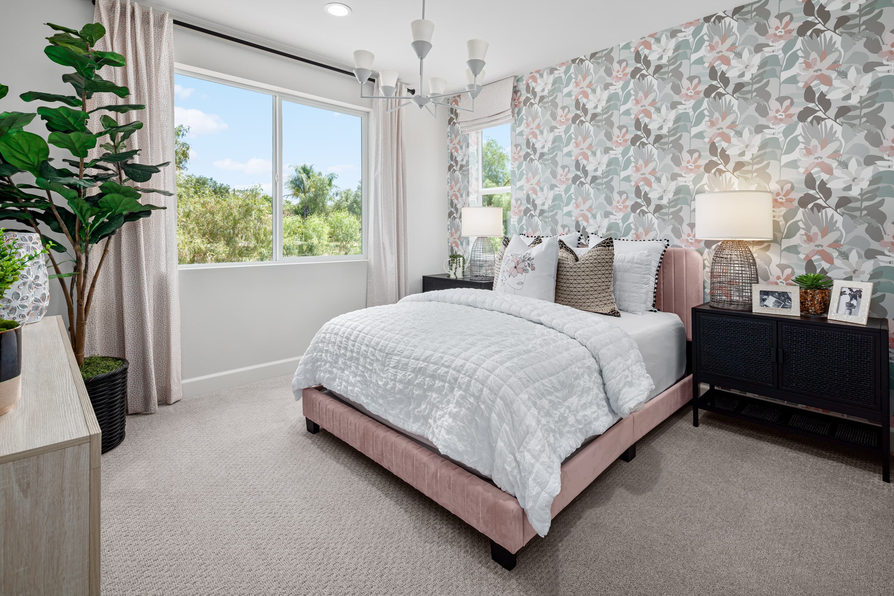 bedroom with neutral carpet and large window