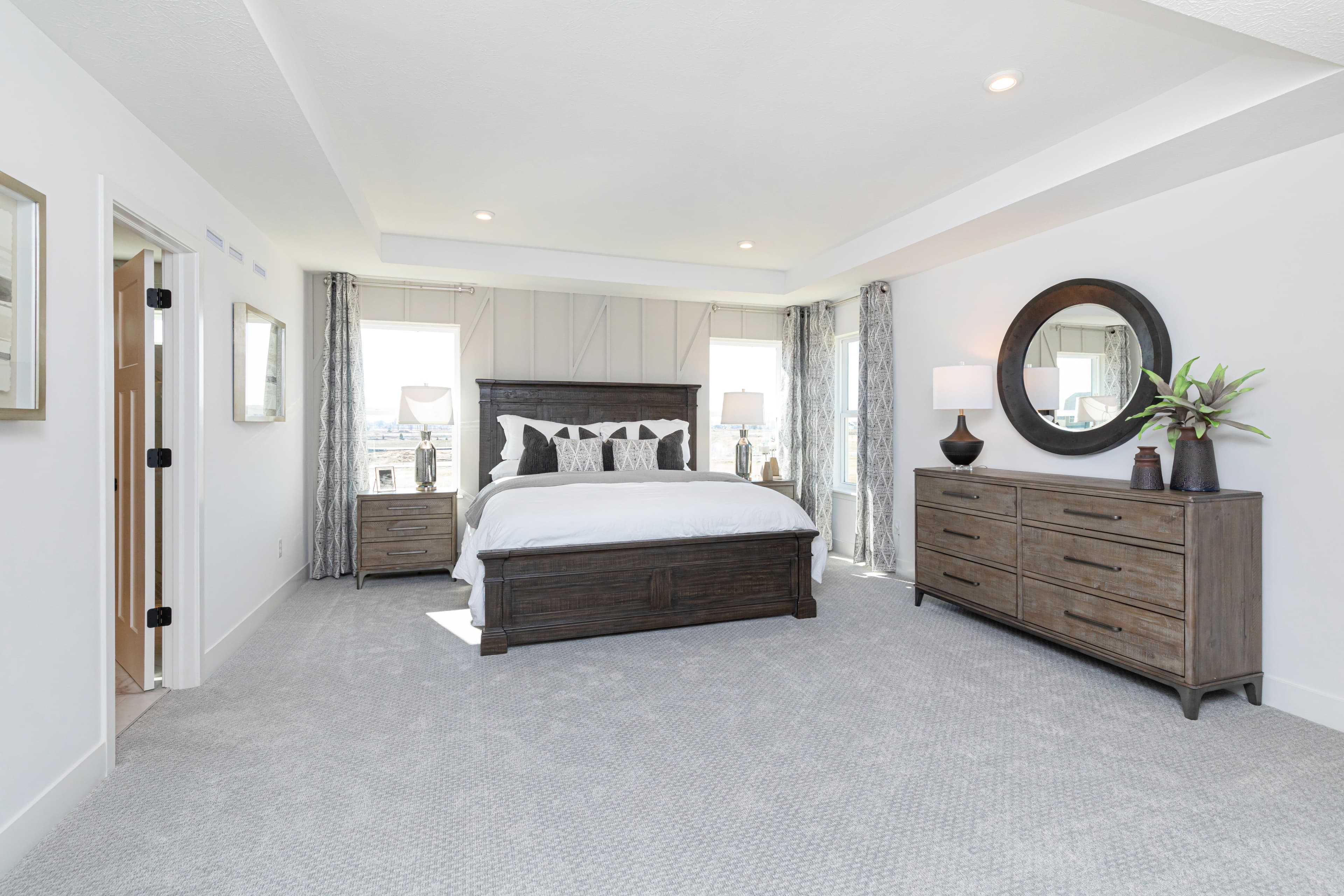 primary bedroom with tray ceiling 