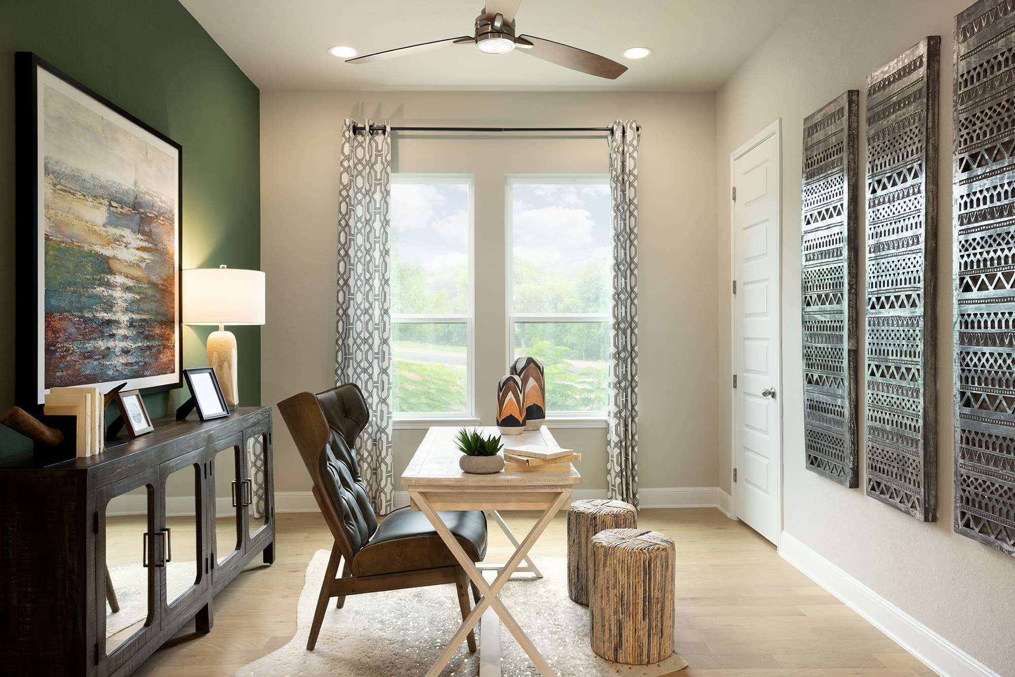 study with desk and large windows