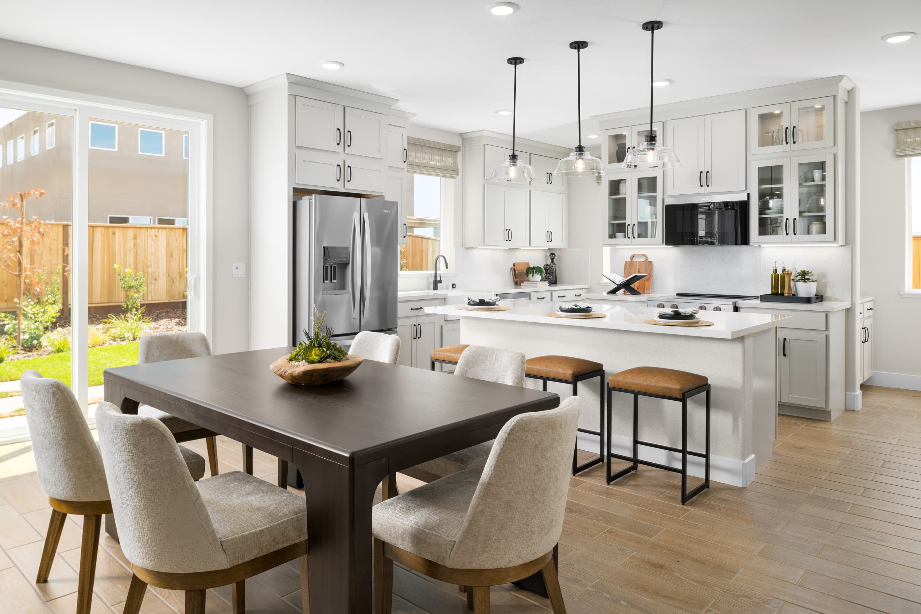 kitchen with white cabinets & counters