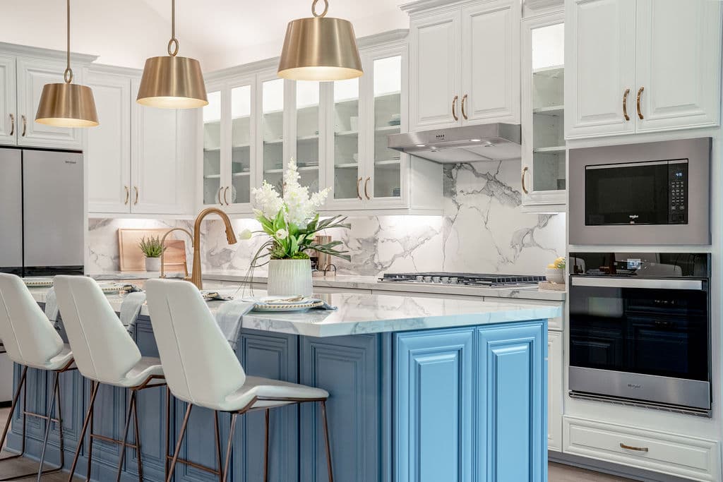 kitchen with two-toned white and blue cabinets