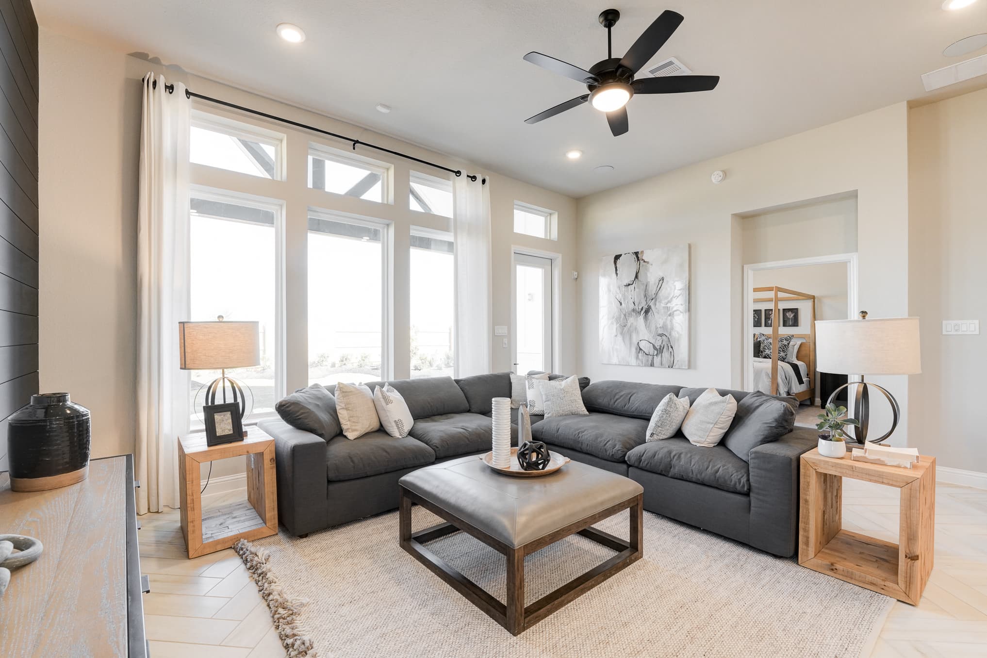 great room with large windows and natural light