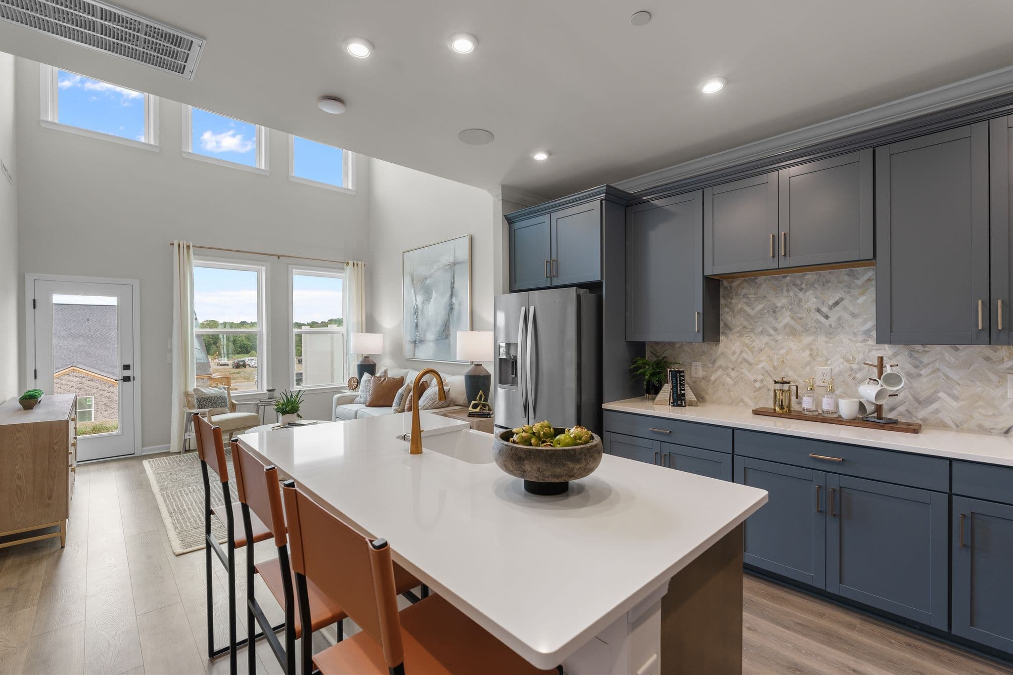 kitchen with blue cabinets and white countertops