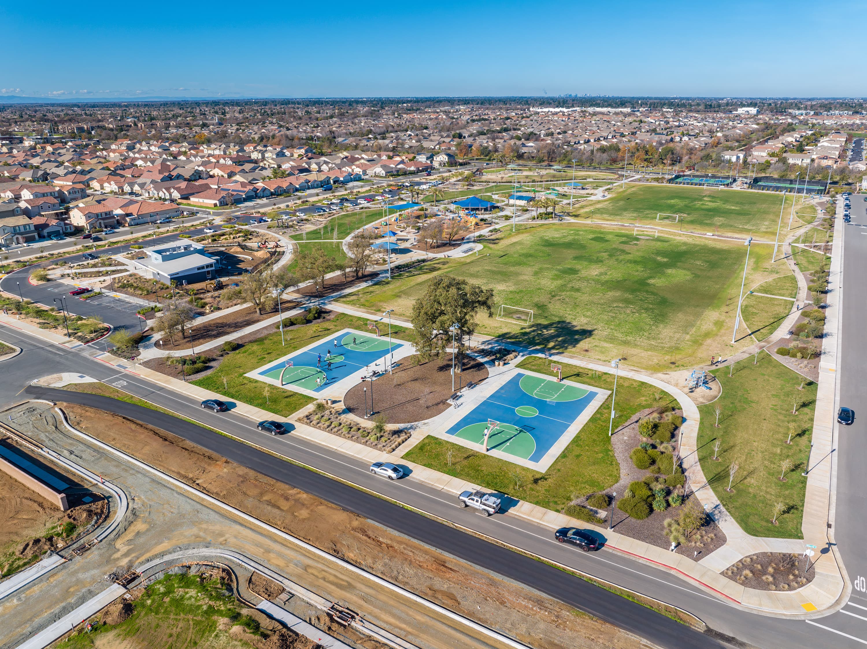 park with two basketball courts and soccer fields