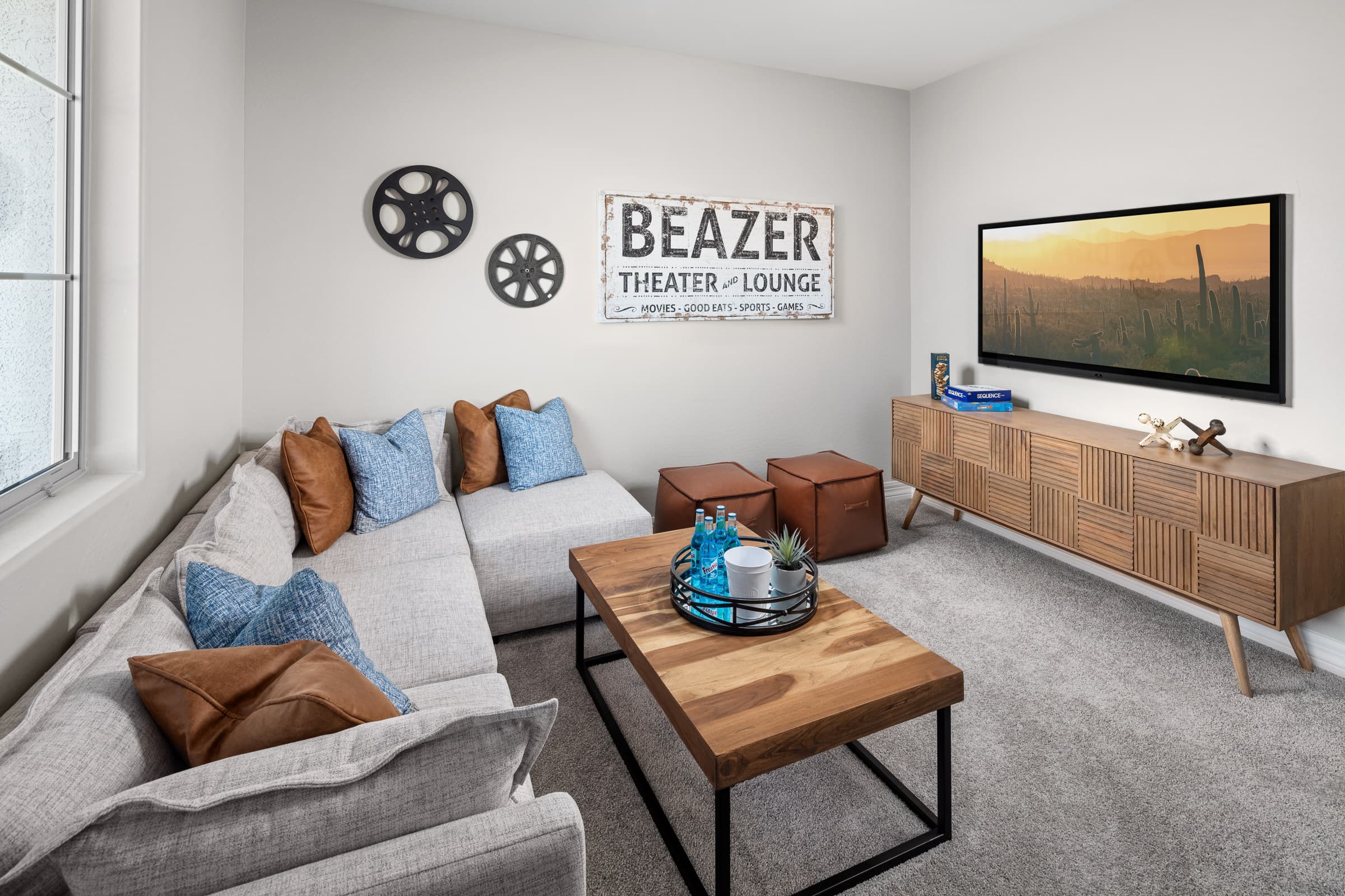 loft area with sofa and tv