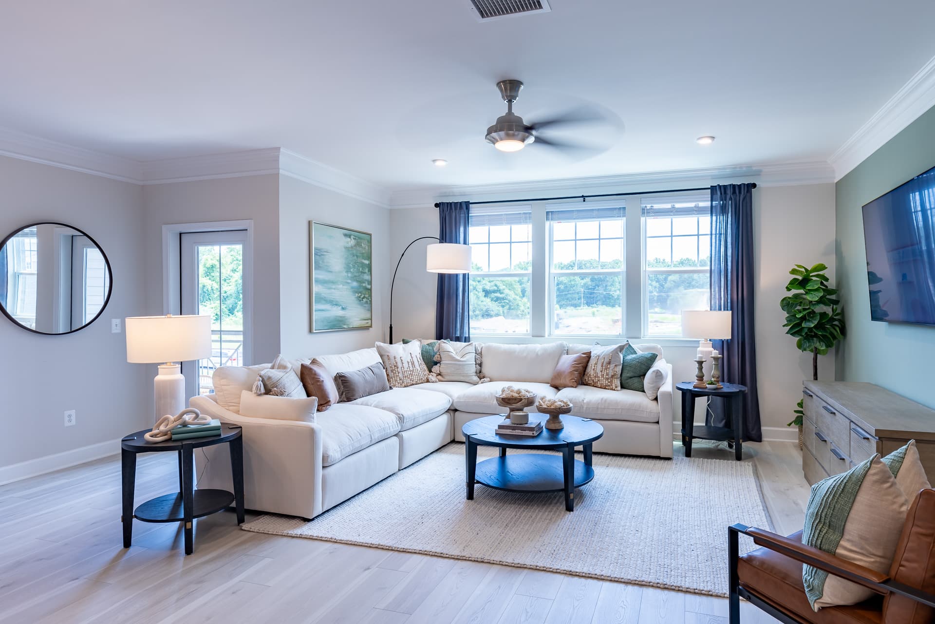 living room featuring a cozy fireplace