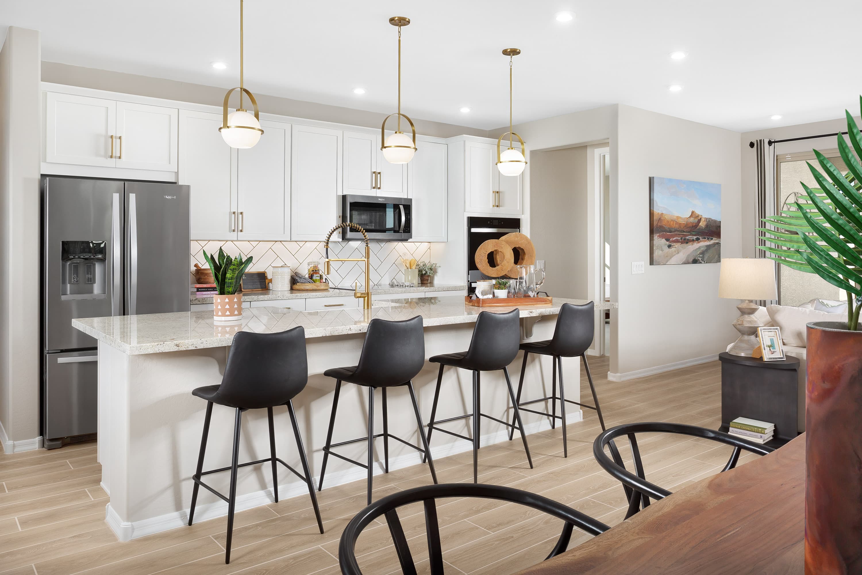 open-concept kitchen with granite countertops