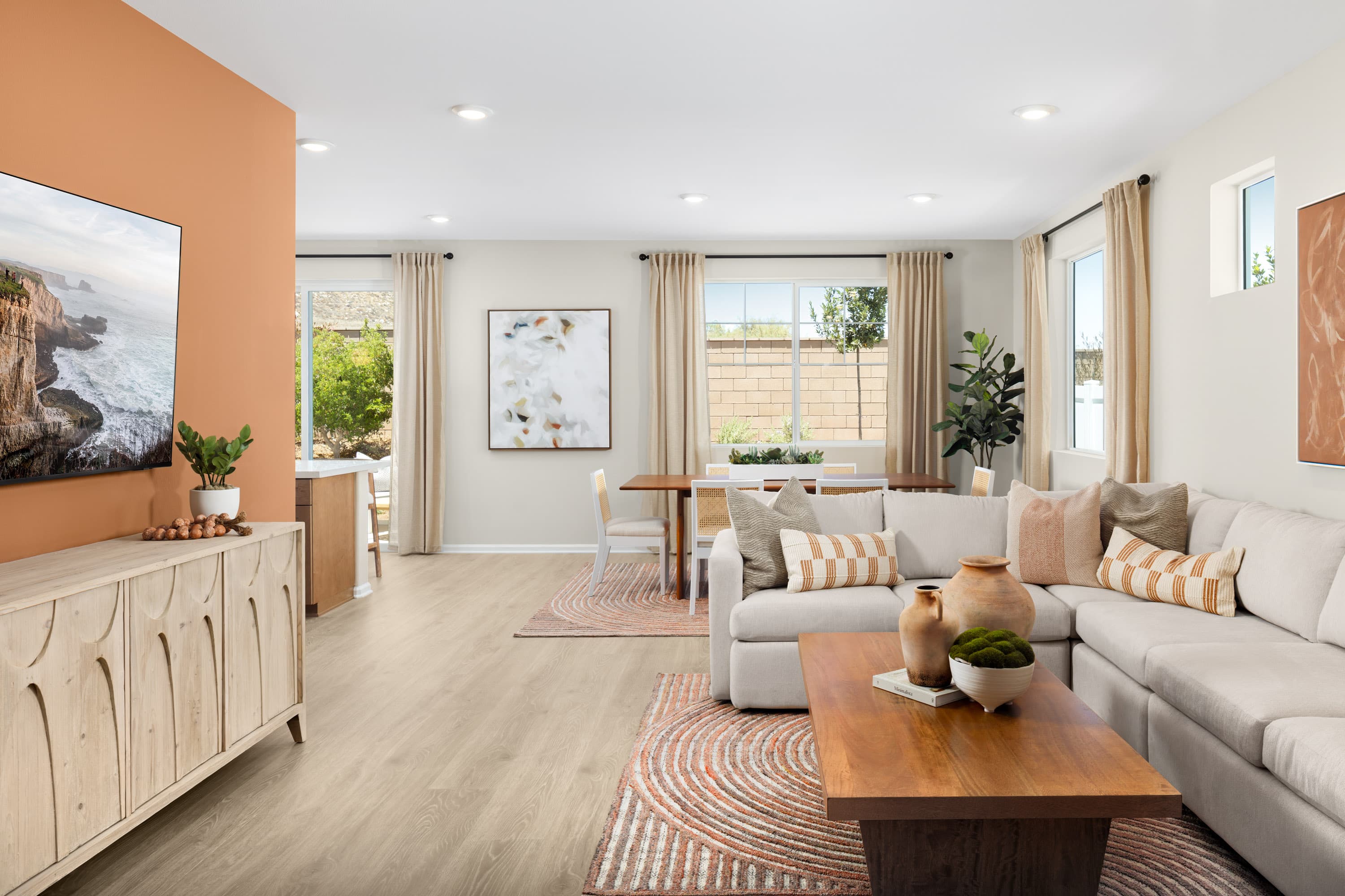 great room with sectional and coffee table
