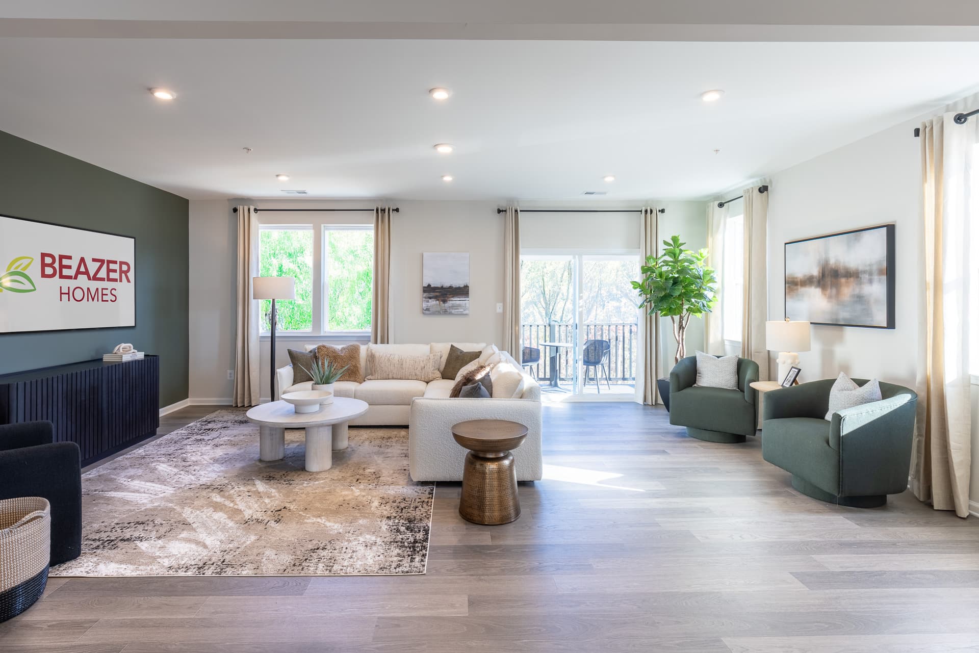 great room with a sectional couch and coffee table