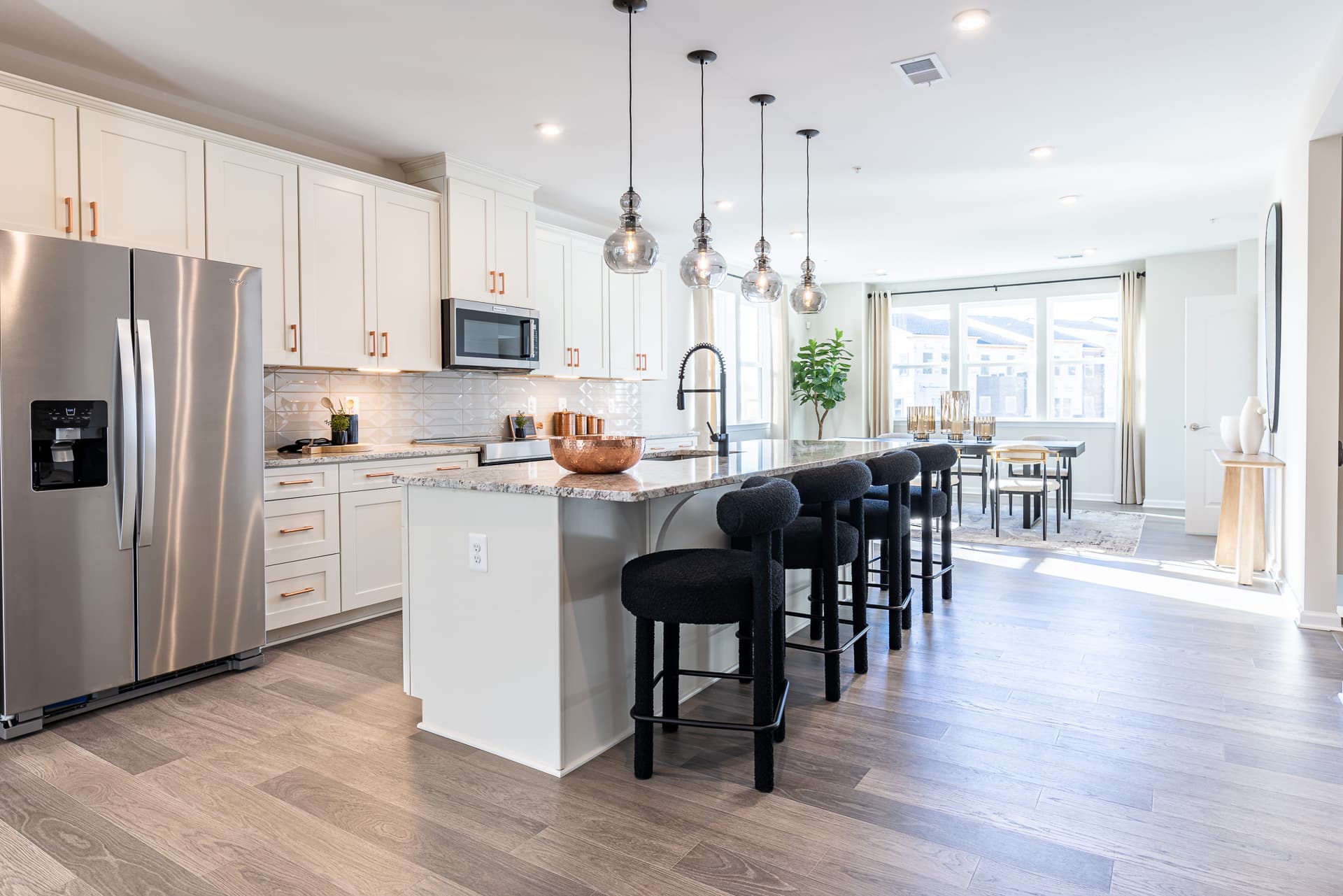 kitchen in white with copper hardware