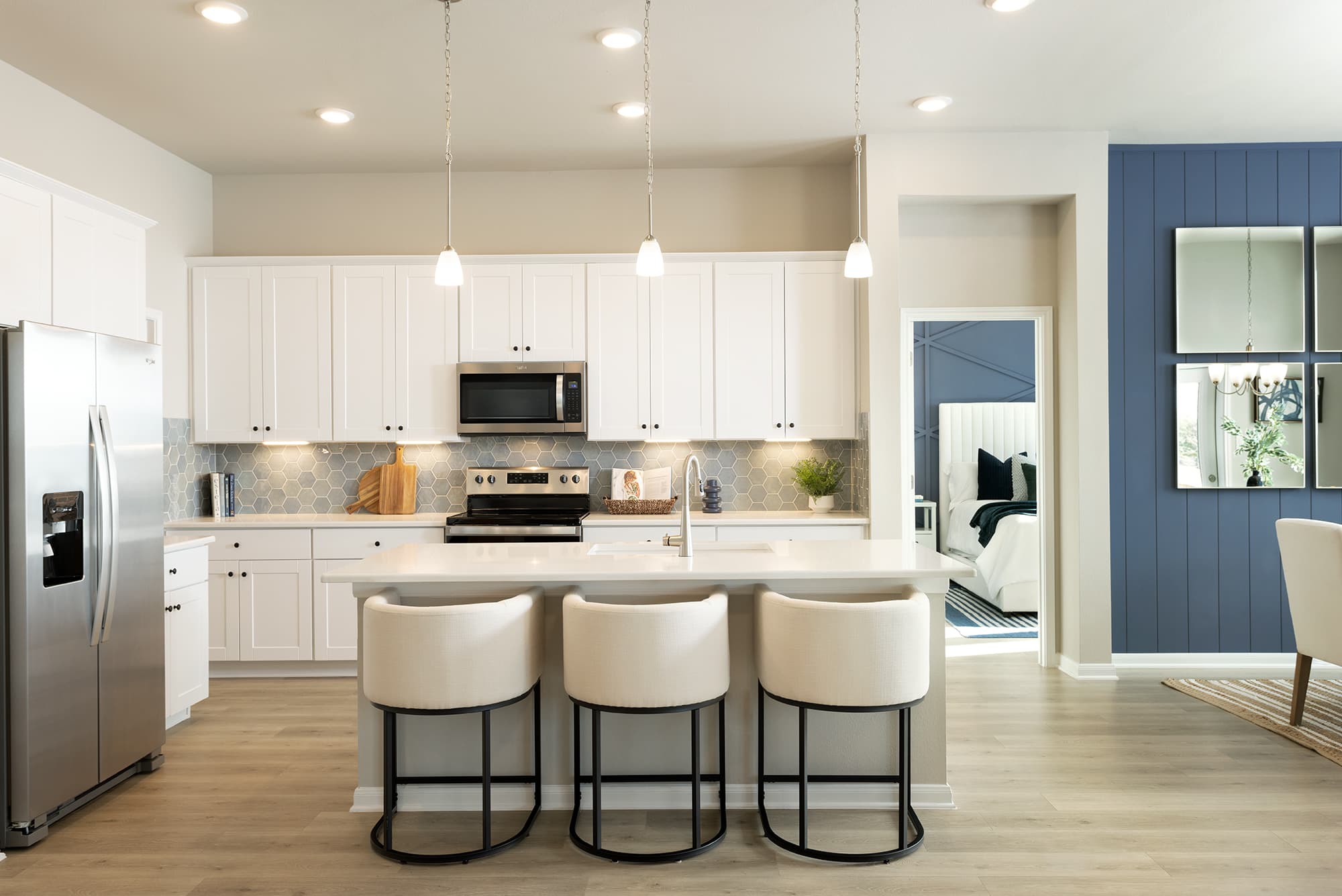 kitchen with barstools & granite countertops 
