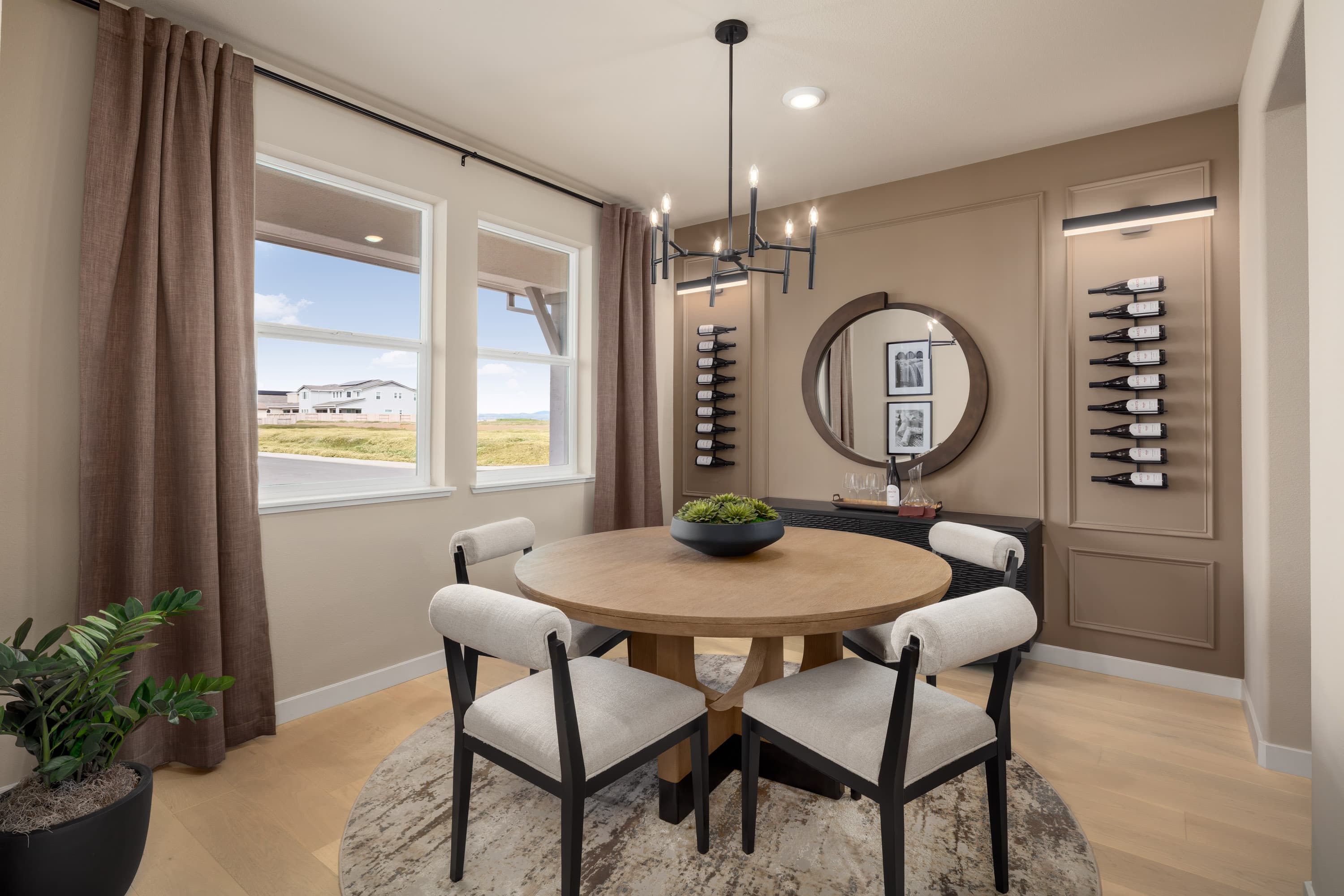 dining room with brown wall and wine racks