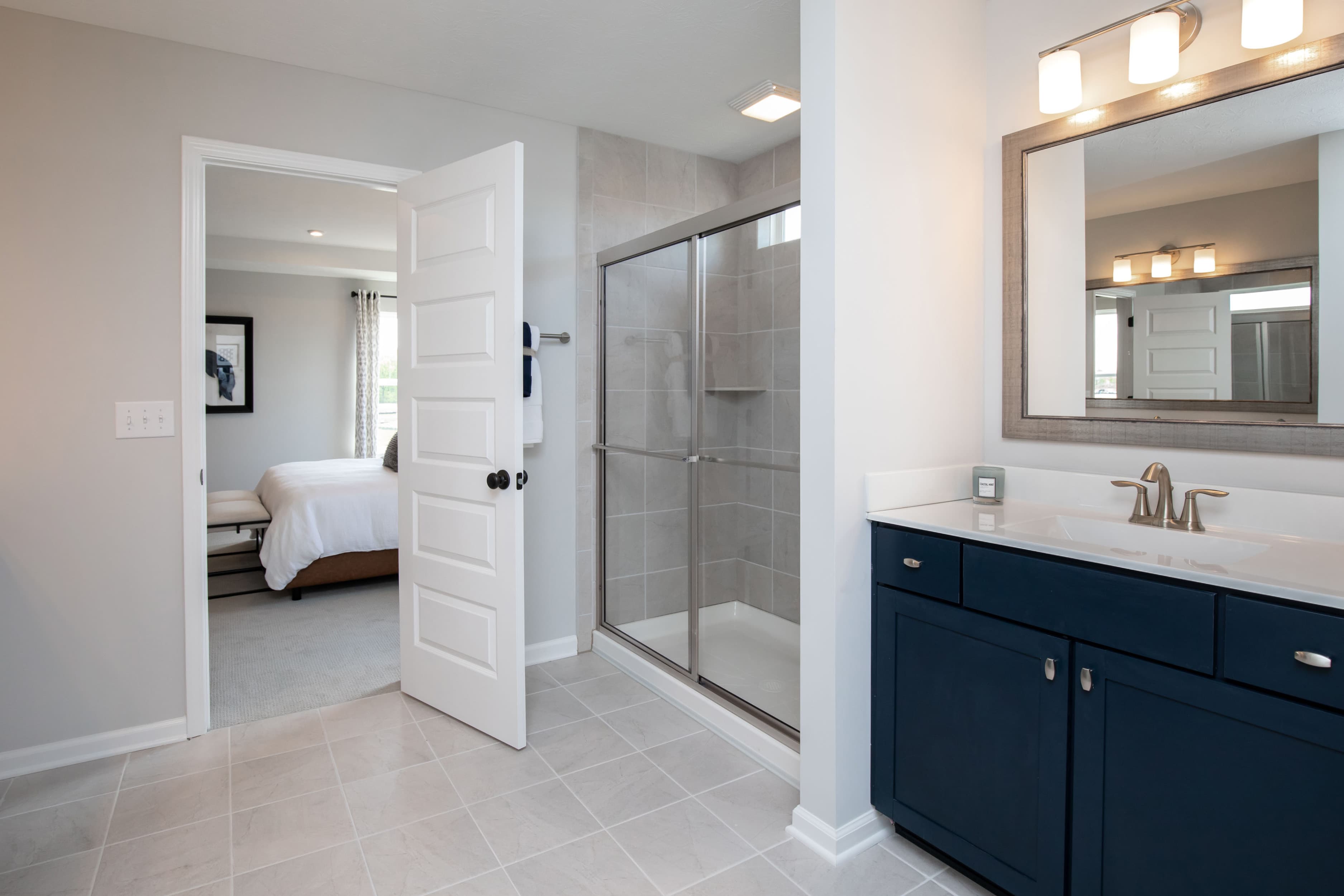 primary bathroom with dual vanities 