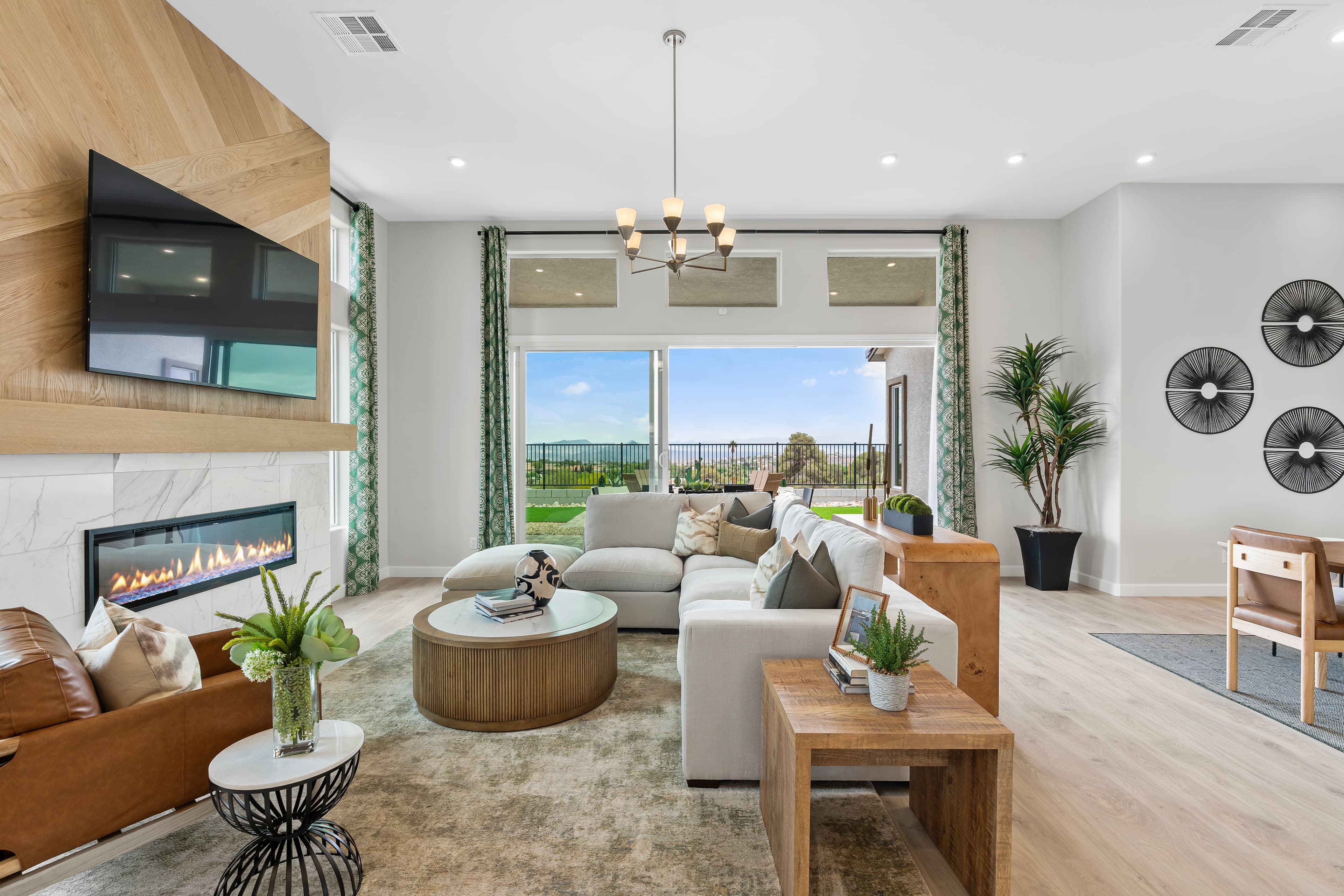 great room with fireplace and sliding glass door