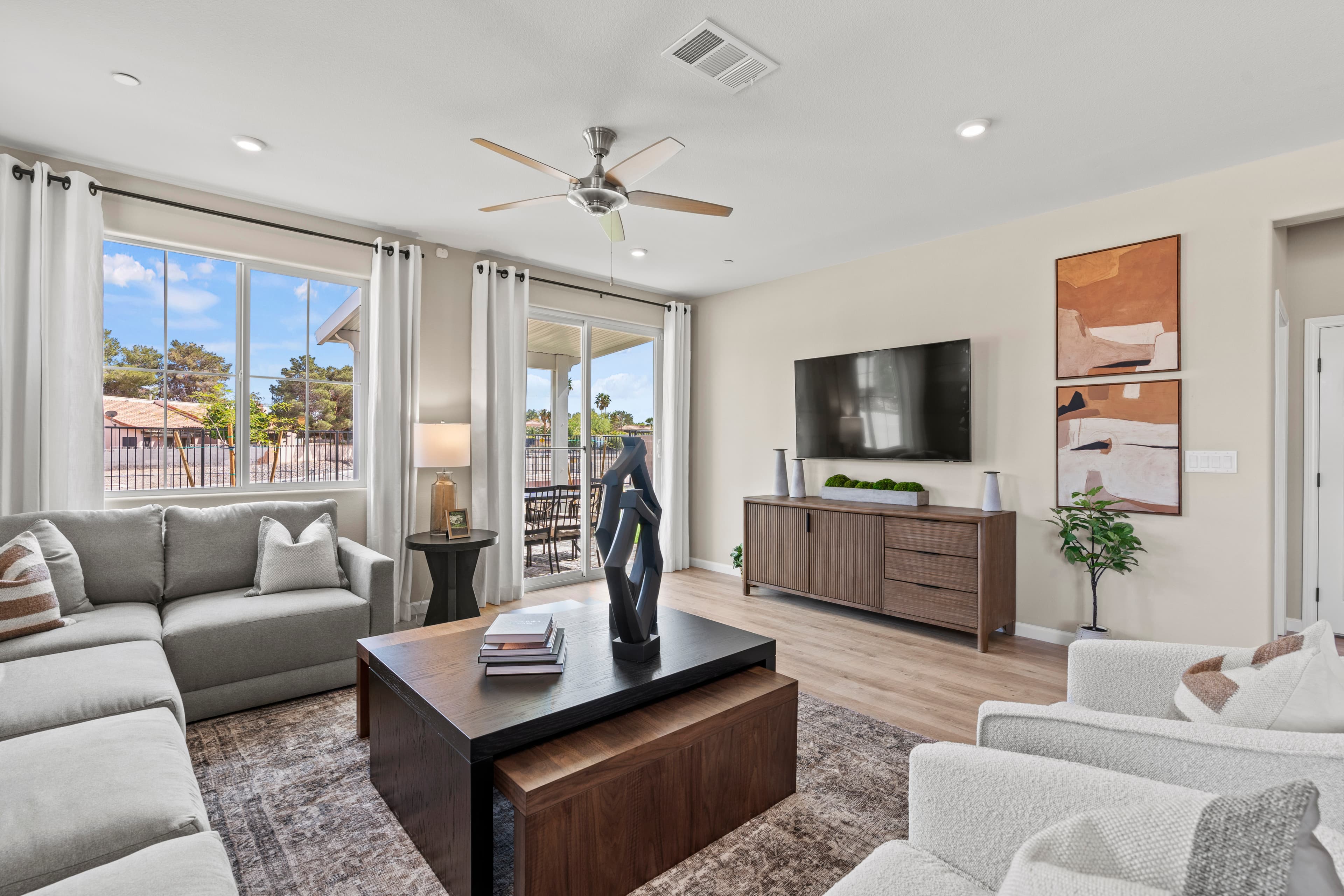 light filled living room with sectional couch