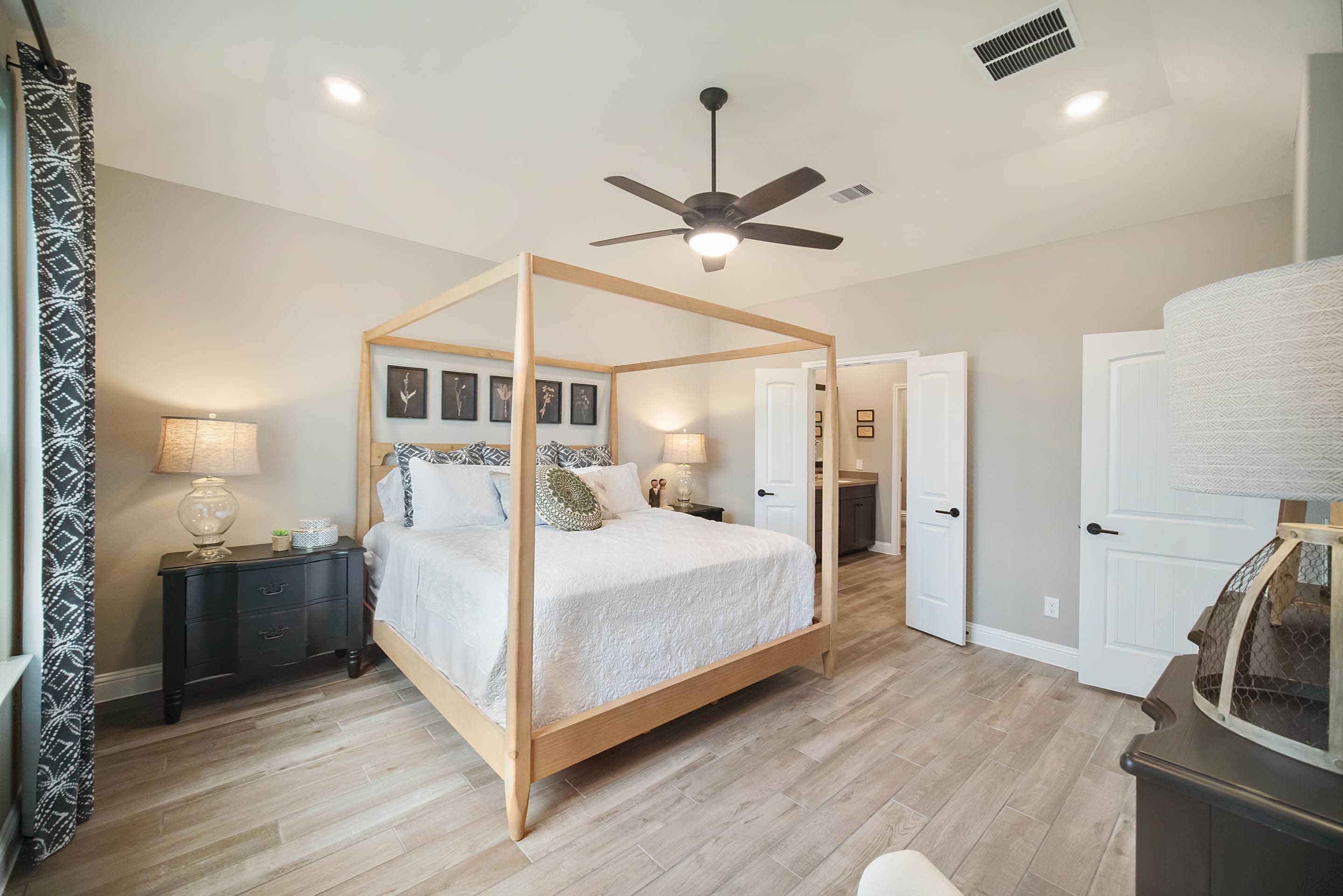 primary bedroom with carpet floors and ceiling fan