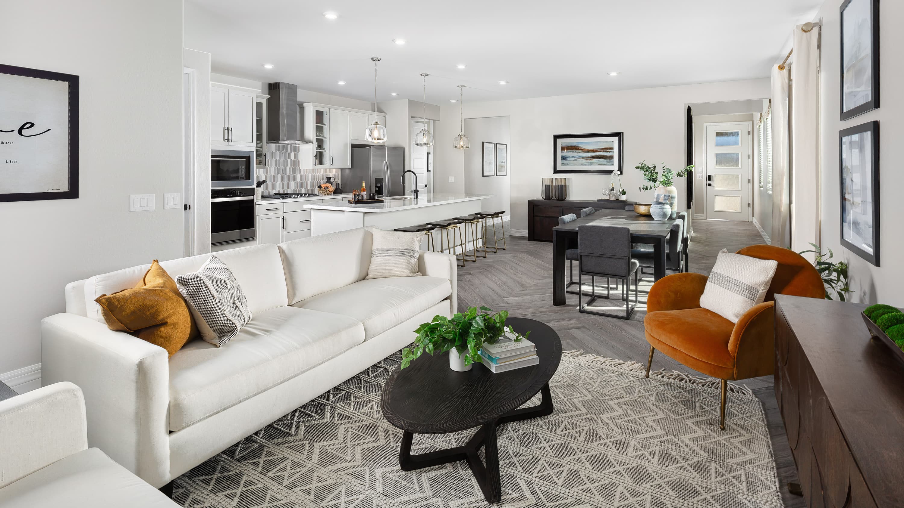 open-concept living space with couch and chair