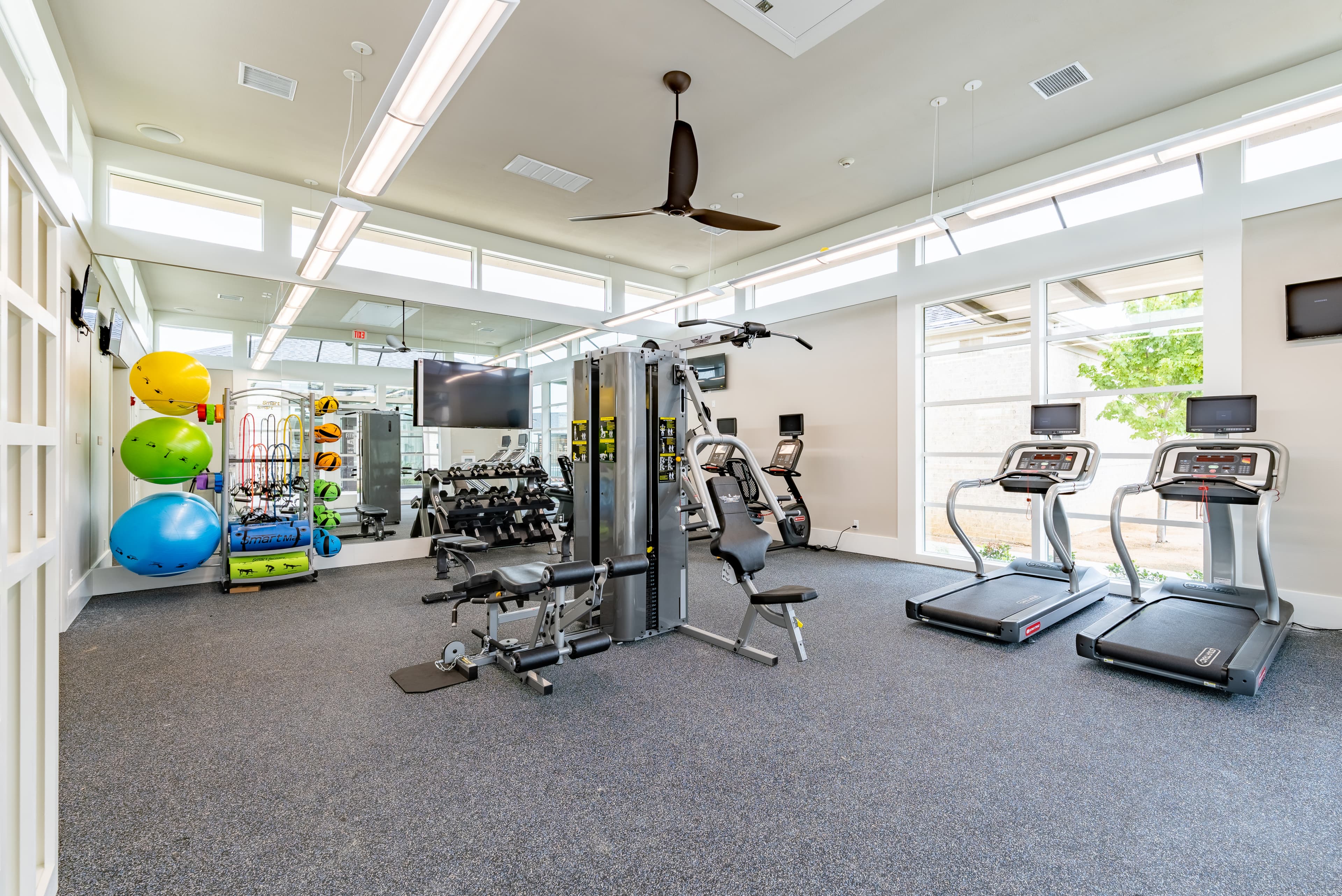fitness center with workout equipment