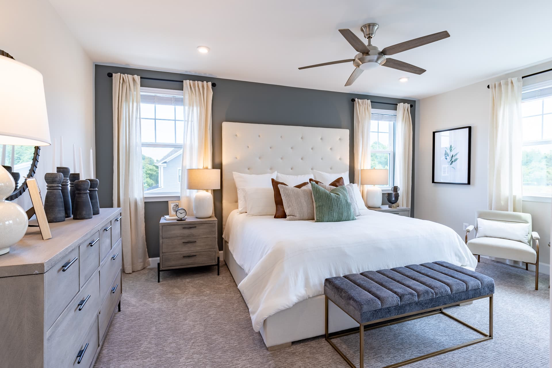 spacious primary suite with carpet