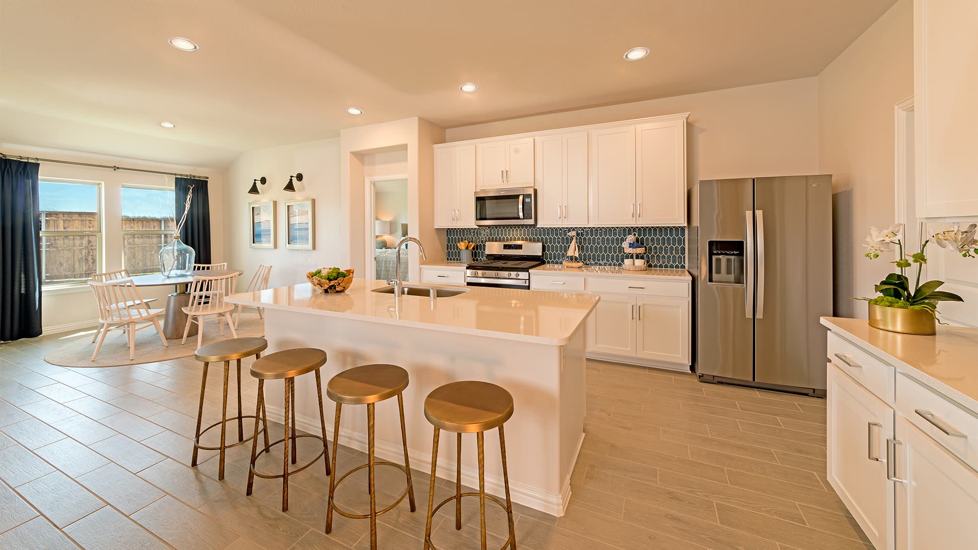 open kitchen with large island and tile floors