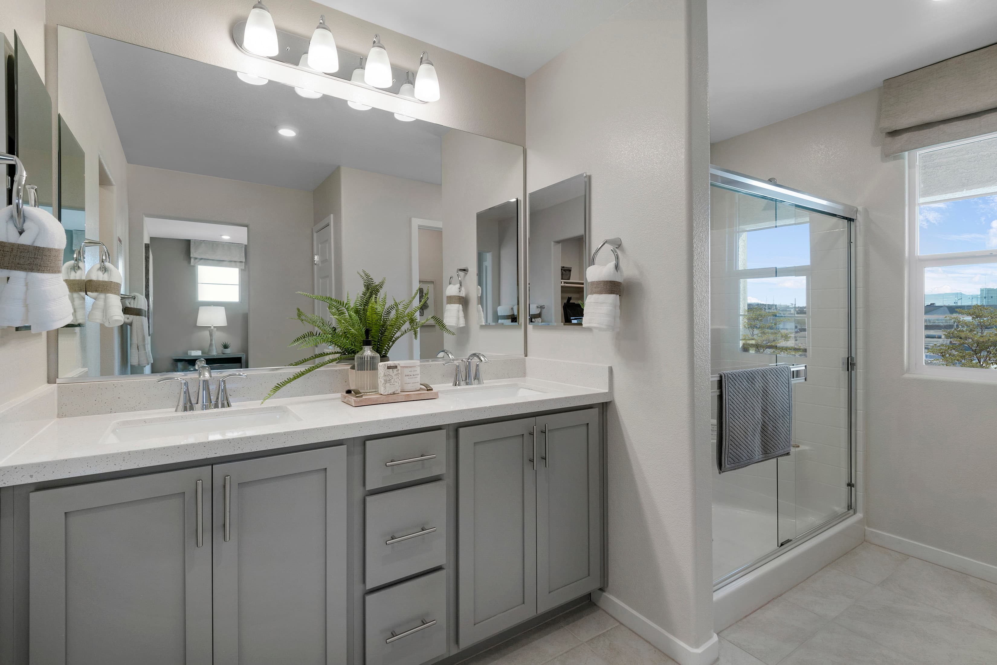 primary bathroom with gray cabinets